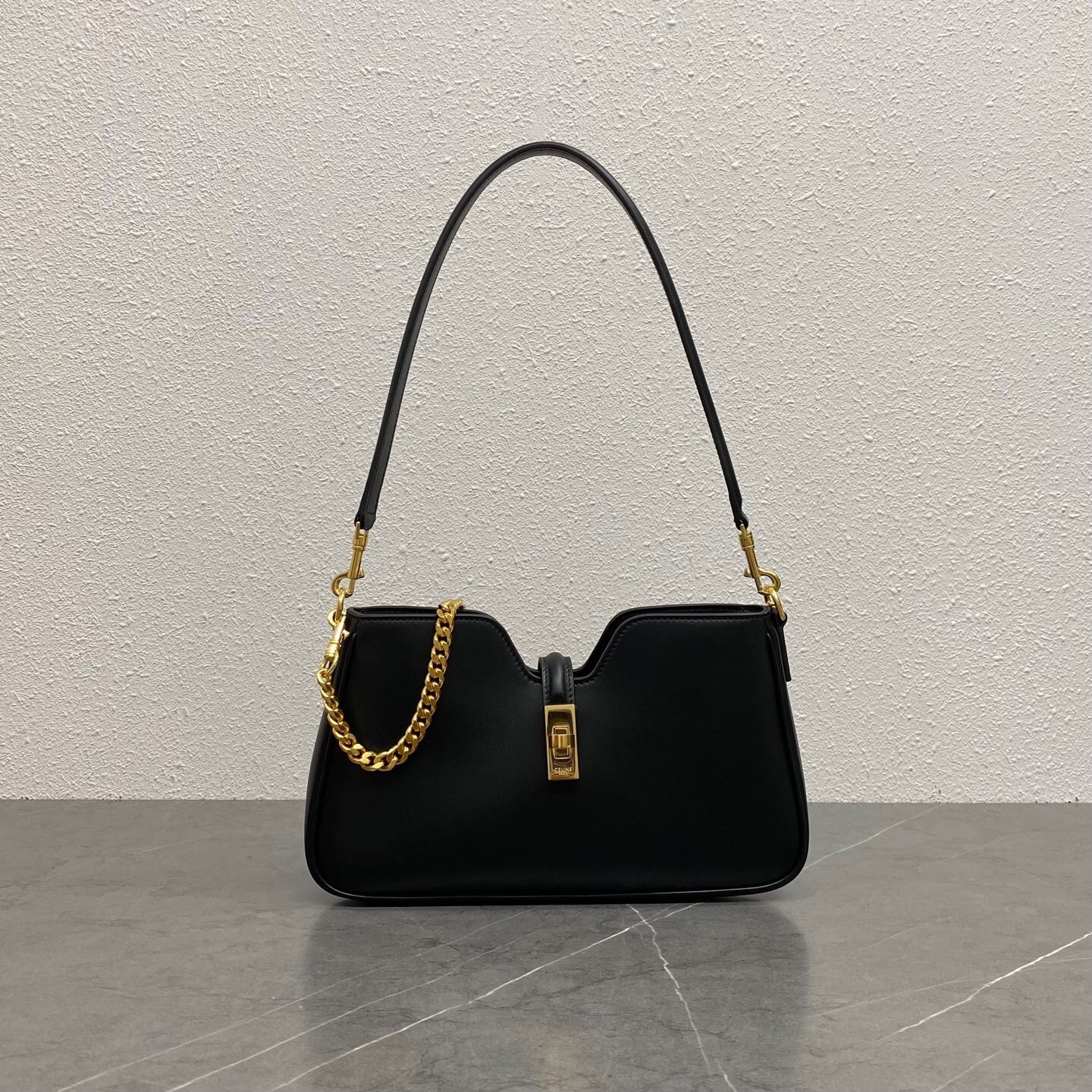 Celine Small 16 bag in black satin calfskin with gold-tone hardware