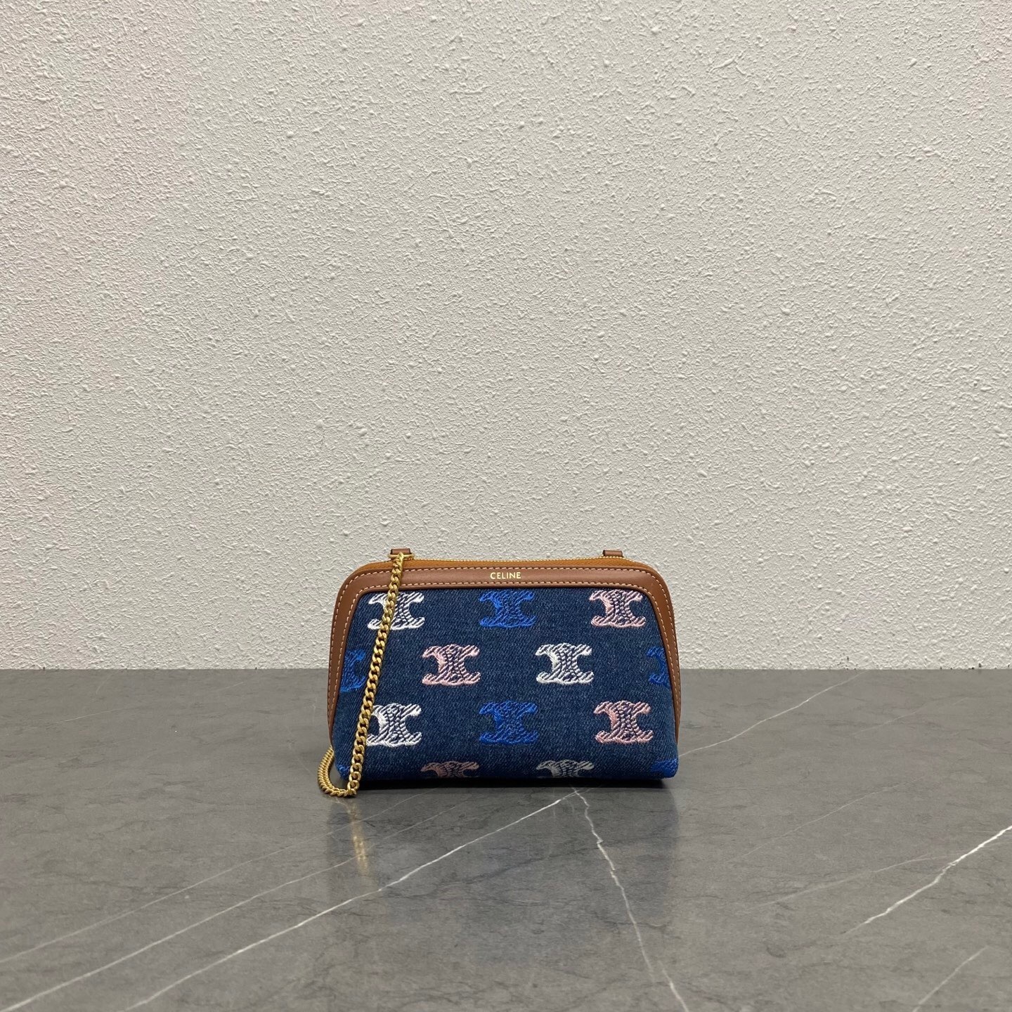 Celine Clutch on Chain Cuir Triomphe bag in denim with all over Triomphe pattern