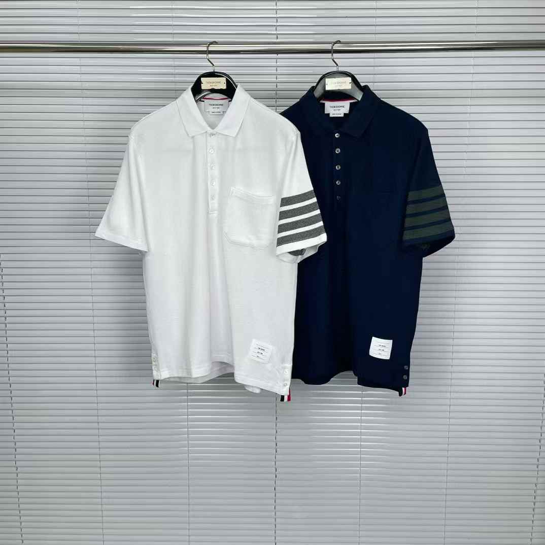 Thom Browne 4-Bar cotton piqué polo shirts in white and navy blue