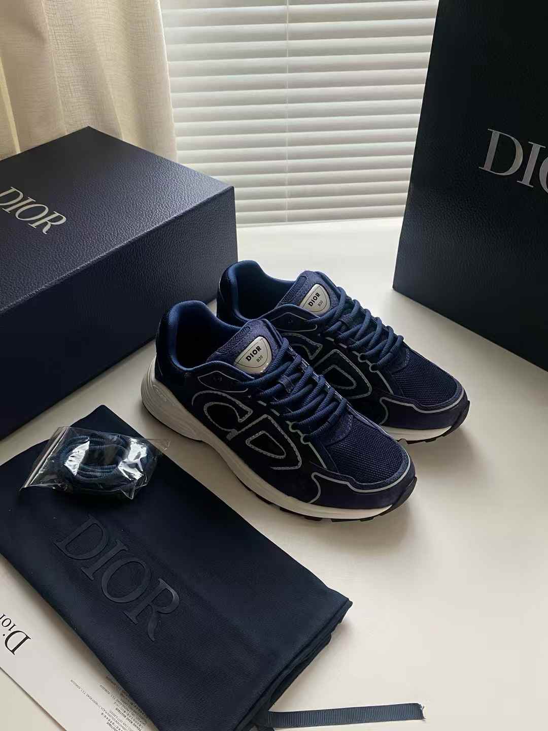 Dior B30 low-top sneakers in navy blue suede and technical mesh