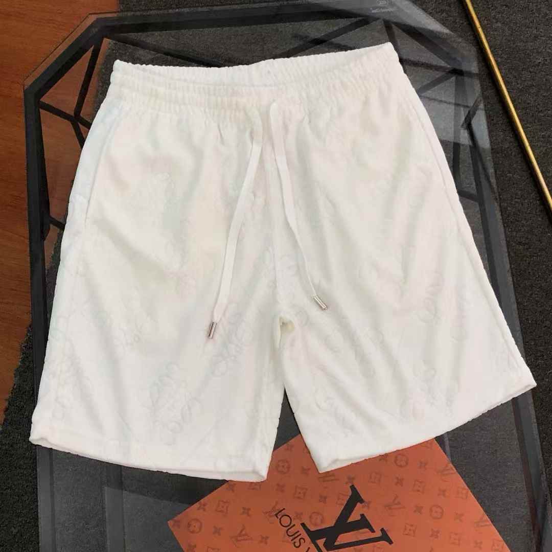 LV shorts with a subtle, allover debossed monogram pattern White