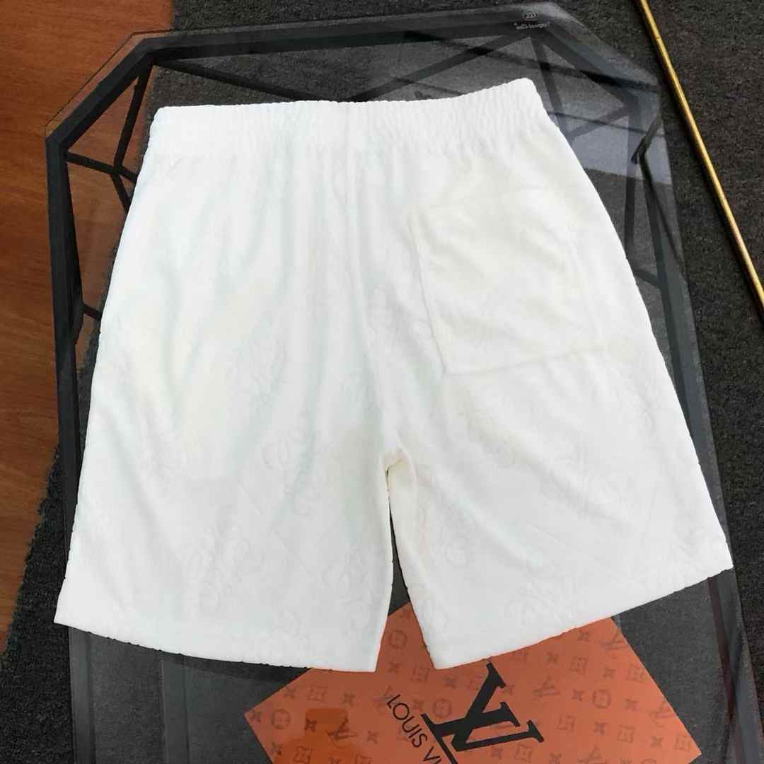 LV shorts with a subtle, allover debossed monogram pattern White