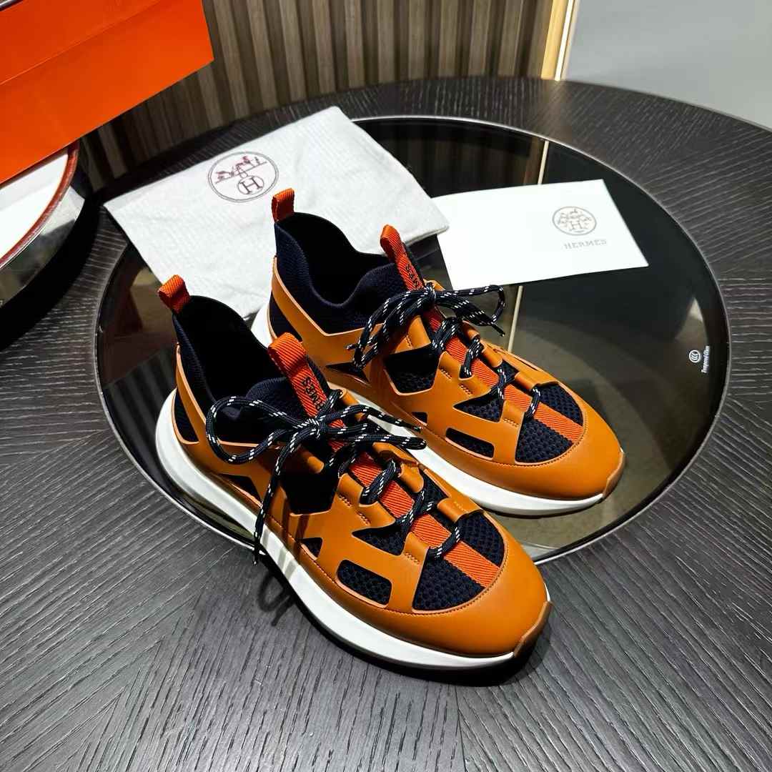Hermes Katana sneakers in orange and blue