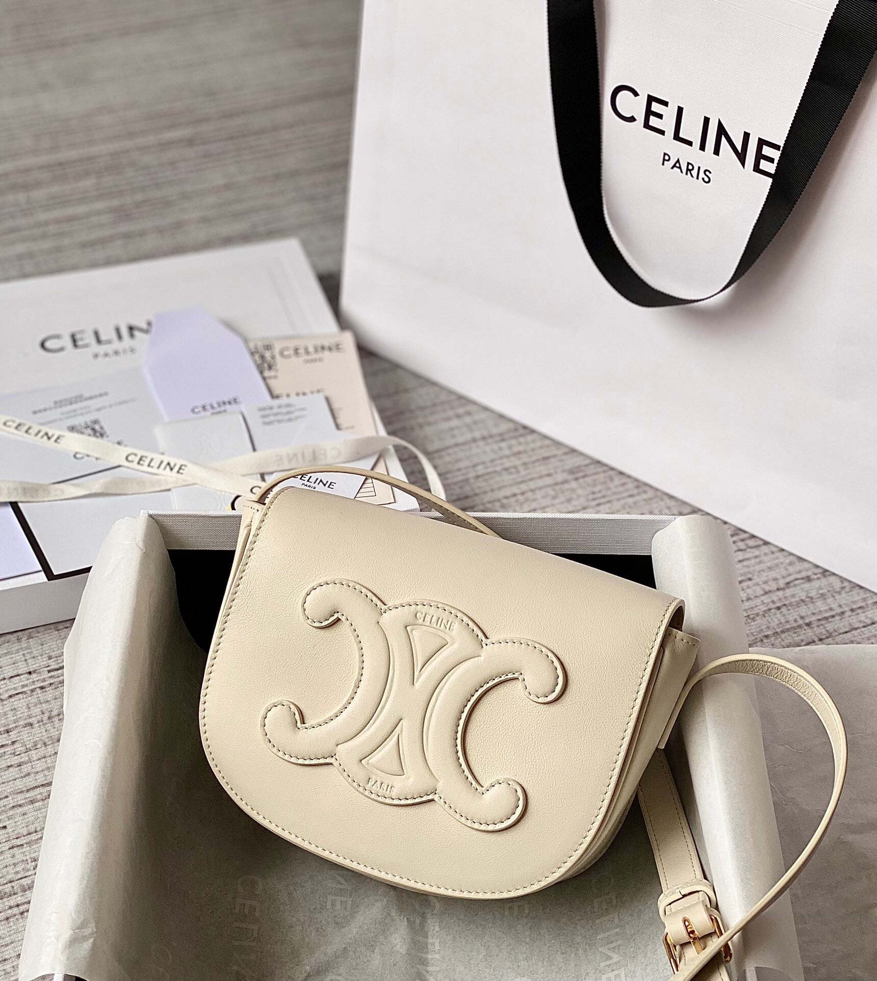 Celine Folco Cuir Triomphe shoulder bag in smooth calfskin and a light color, possibly tan or off-white