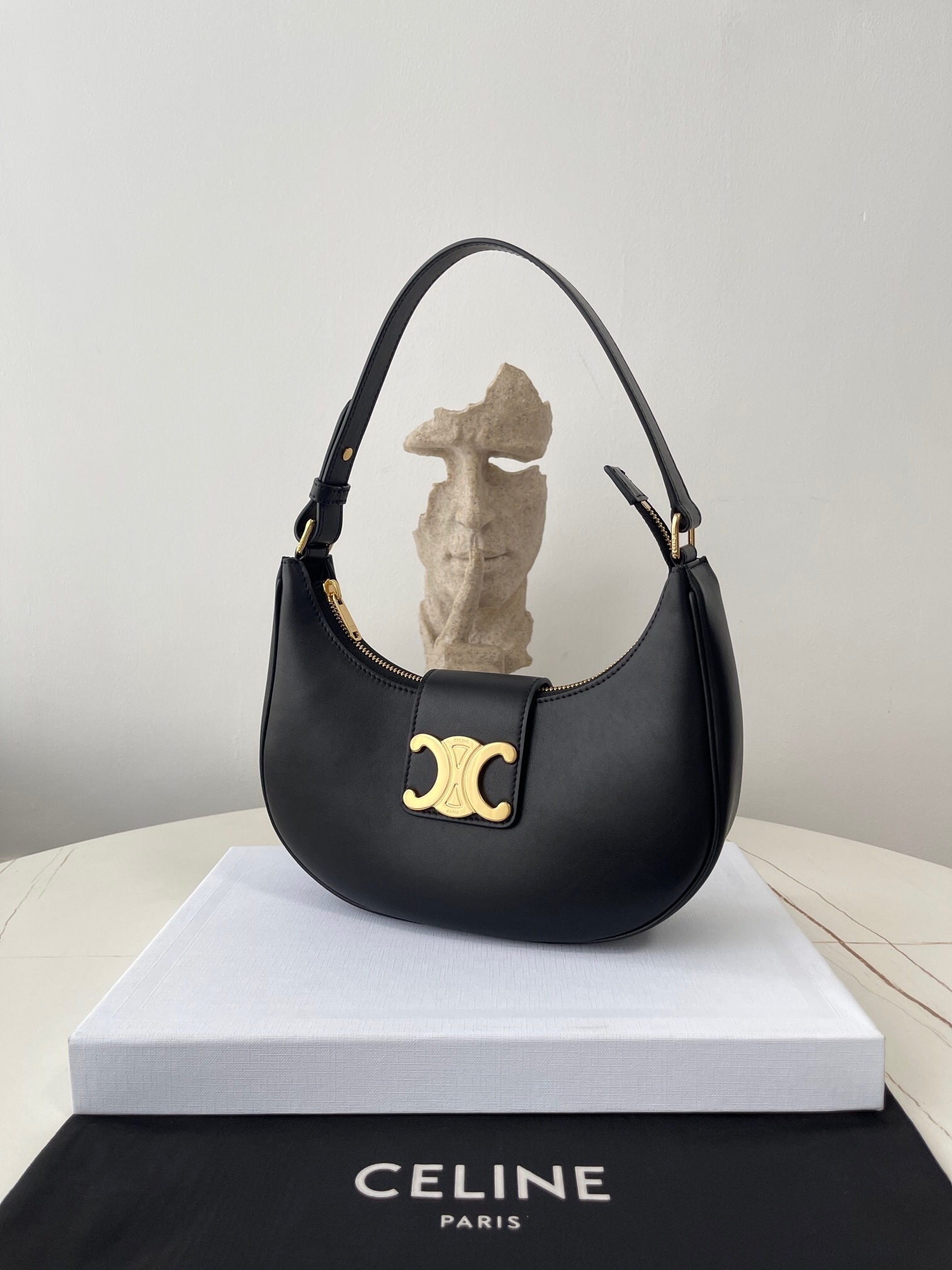 Celine Medium Ava Triomphe Bag in black smooth calfskin with gold-tone hardware