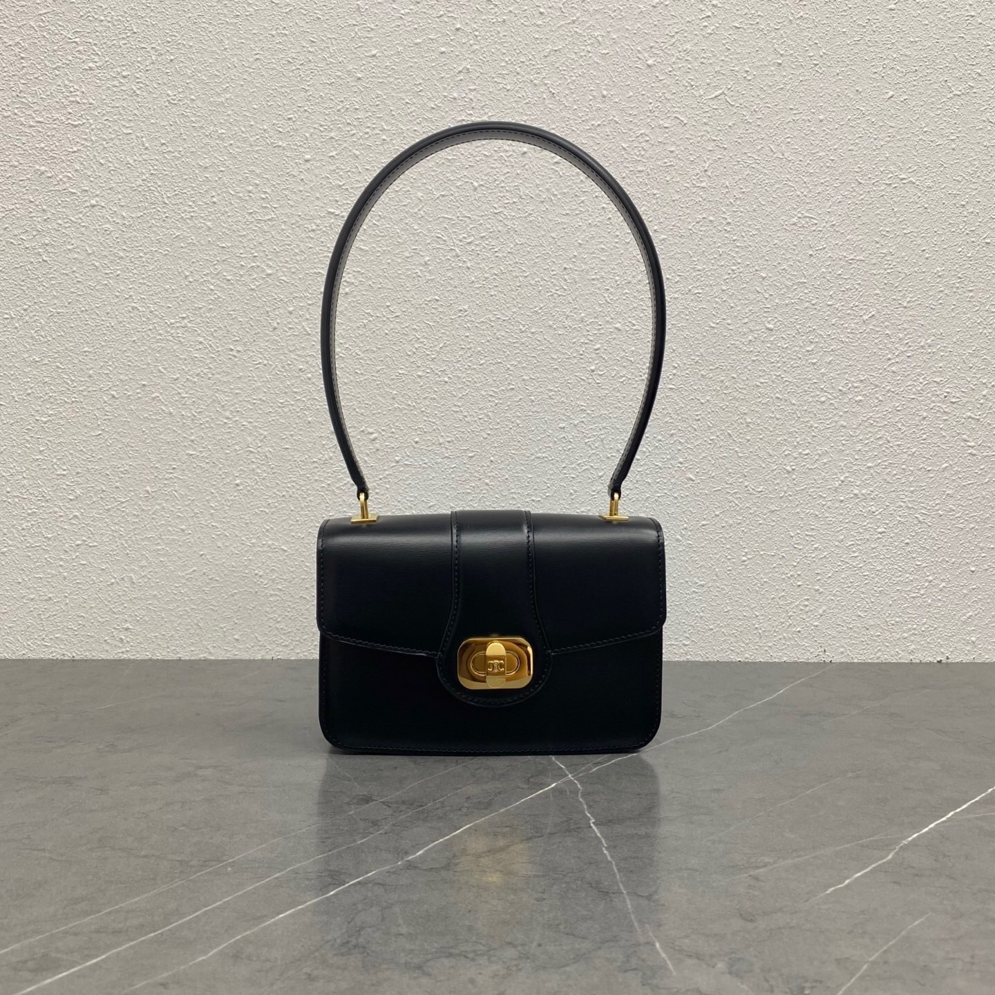Celine Teen Josephine shoulder bag in black shiny calfskin leather with gold-tone hardware