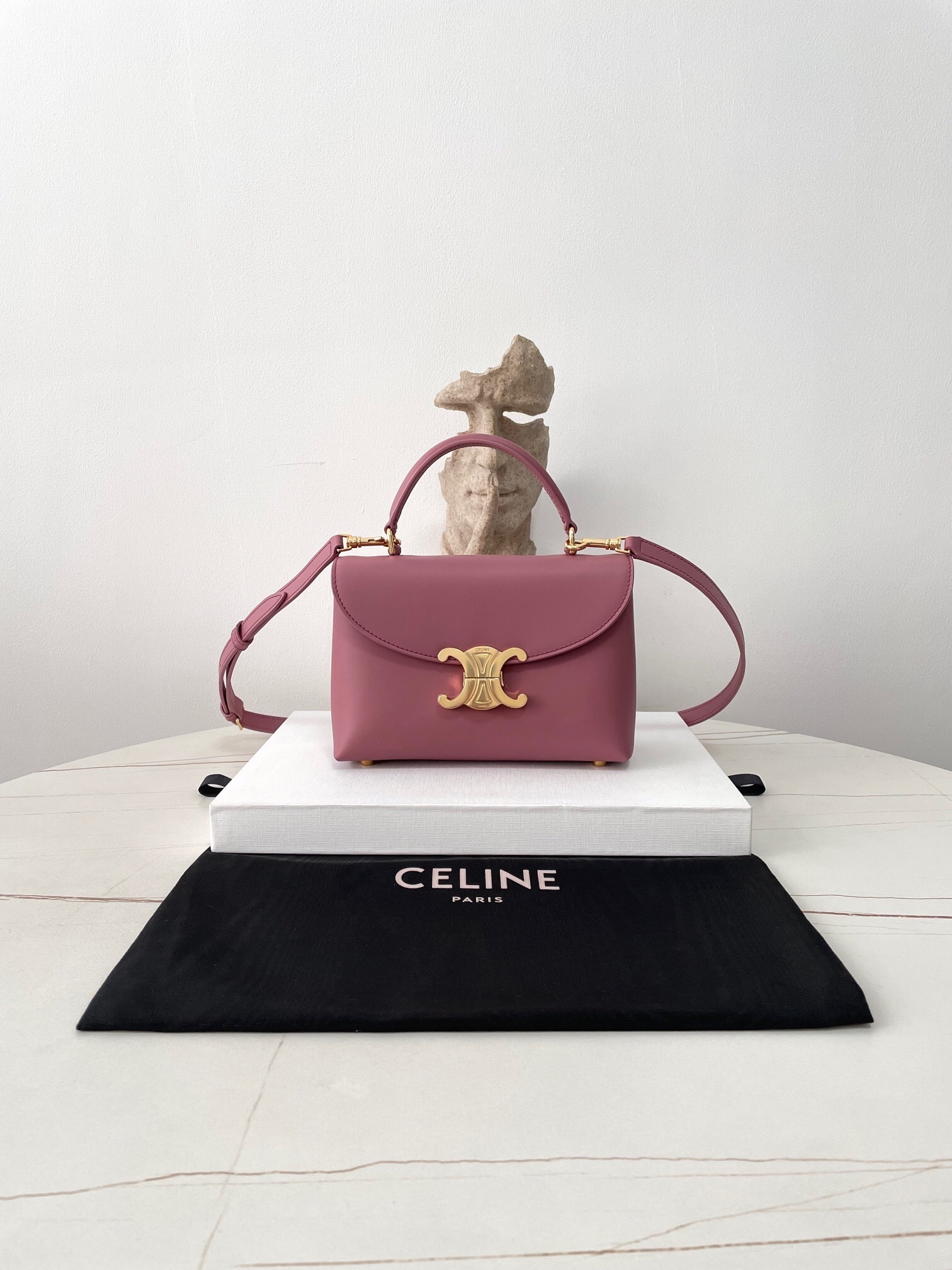 Celine Teen Nino Bag in a pink smooth satinated calfskin leather with gold finishing