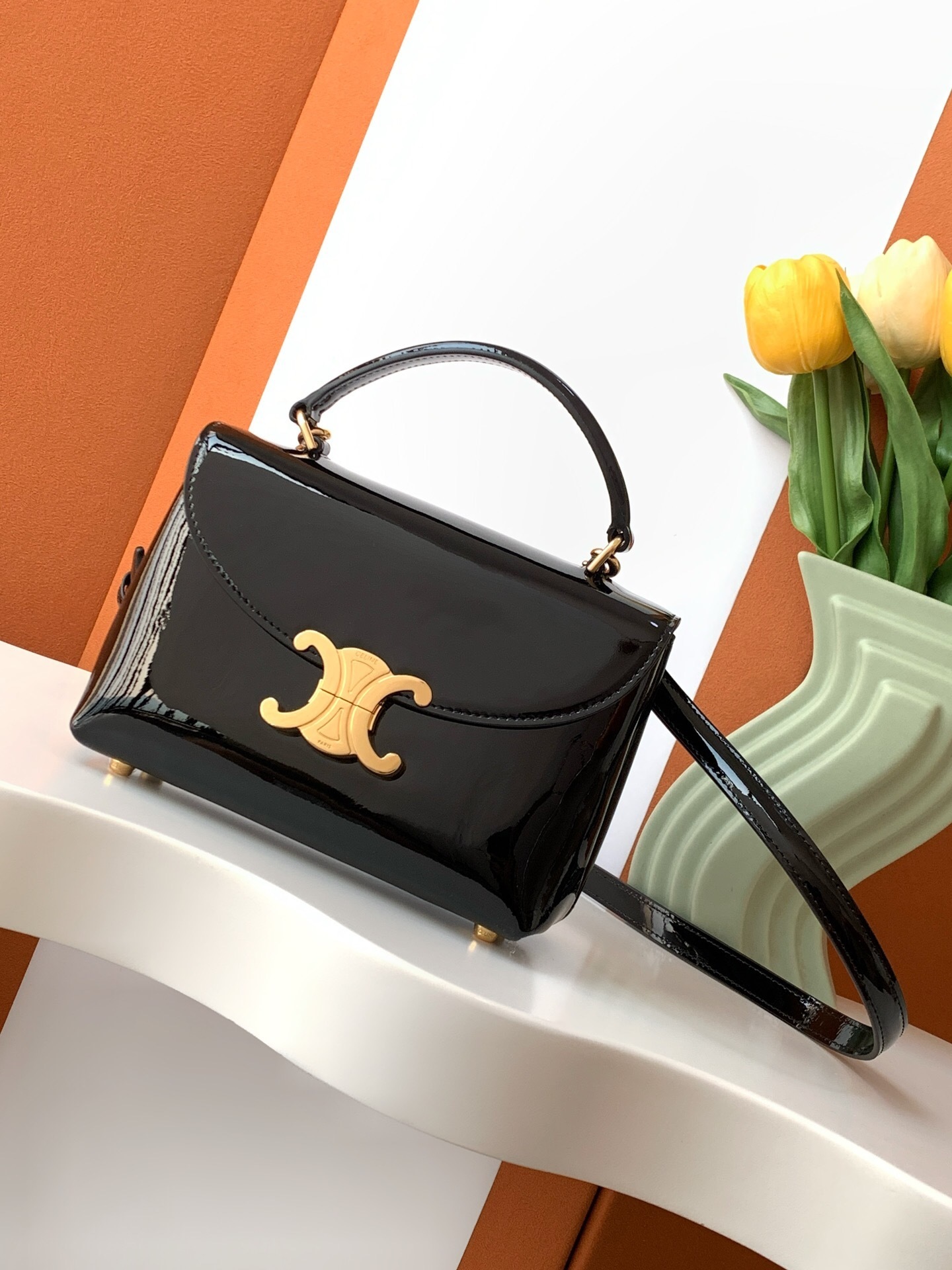 Celine Teen Nino Bag in black patent calfskin leather with a Triomphe metallic closure