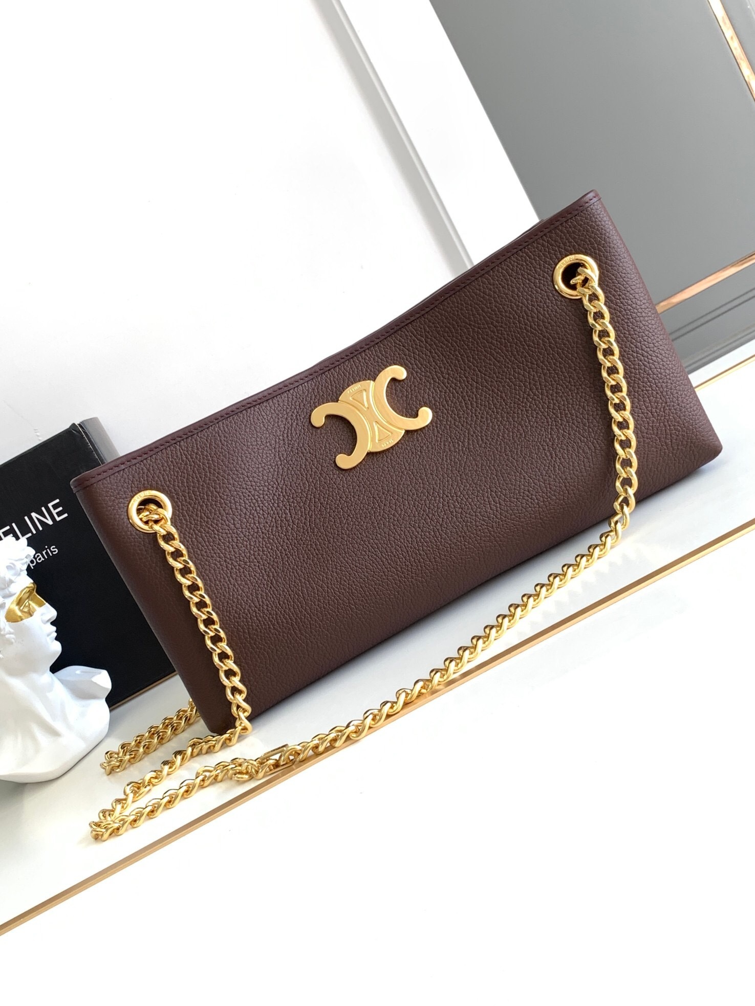 Celine Newspaper Chain Bag Triomphe Soft in Supple Calfskin with a gold finish in Chestnut color