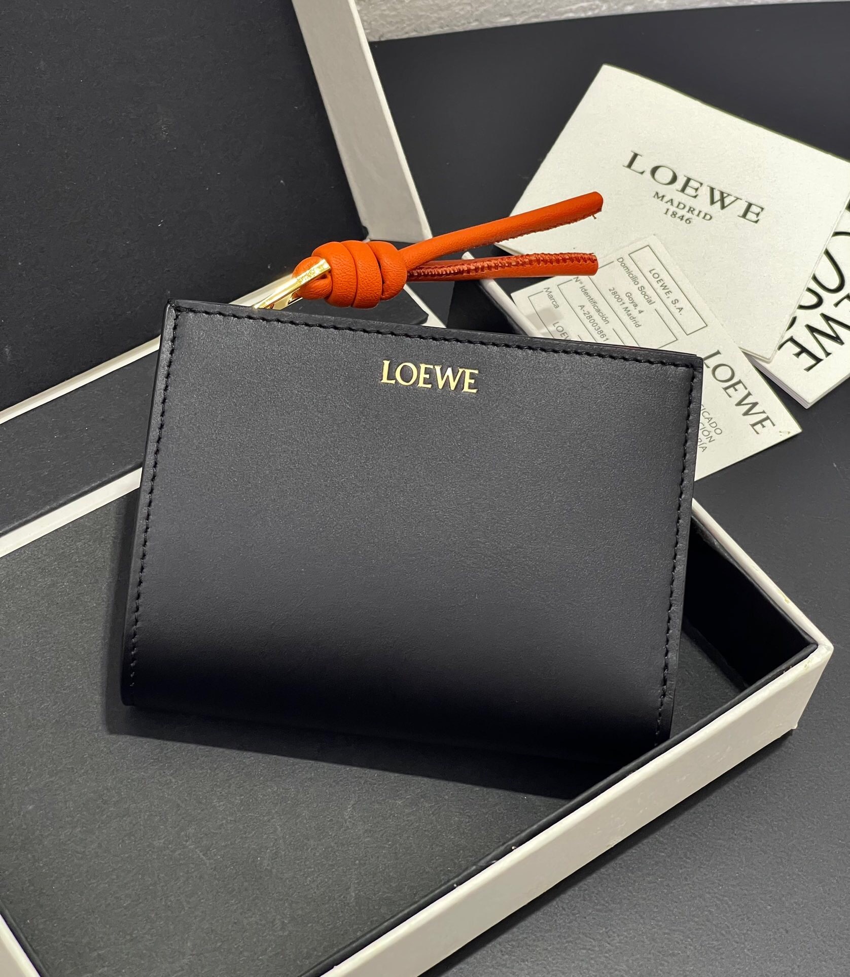 Loewe Knot Compact Zip Around Wallet in black shiny nappa calfskin