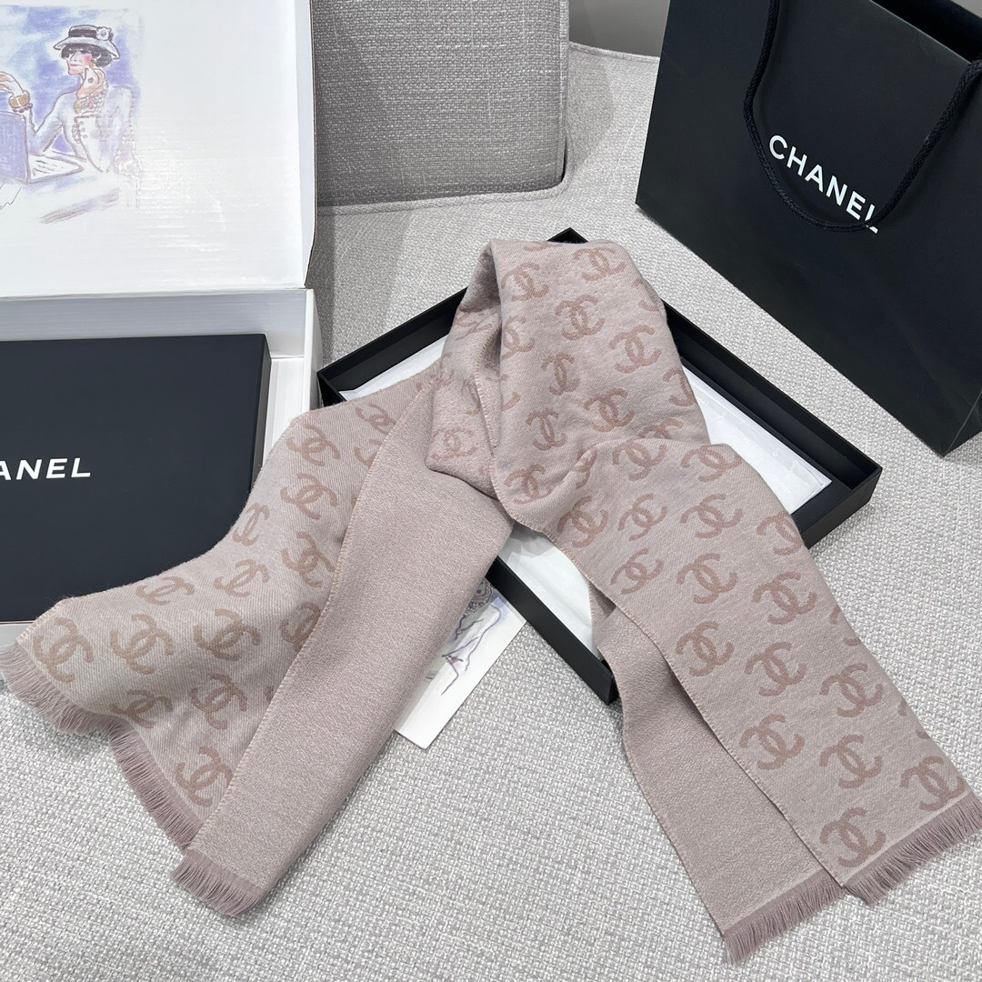 Chanel scarf with a repeating beige interlocking C logo pattern