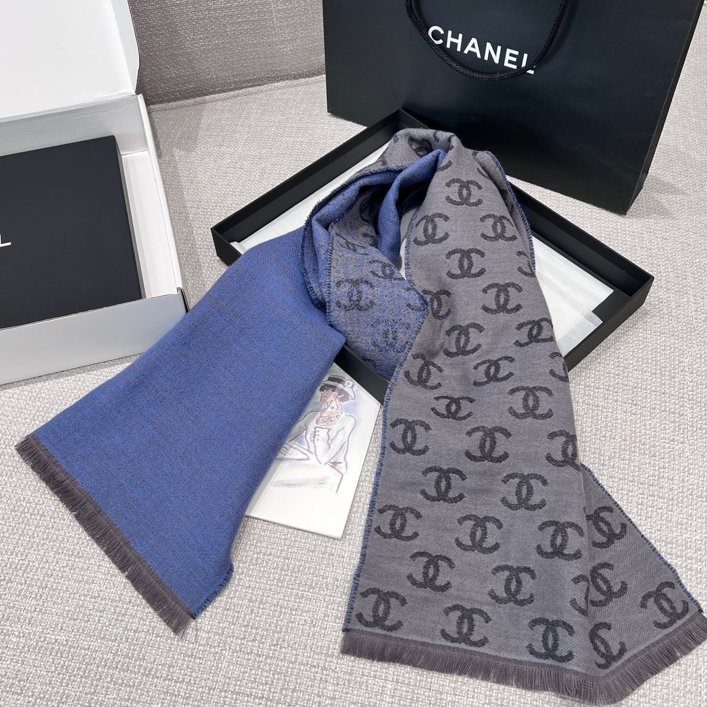 Chanel scarf with the interlocking CC logo pattern