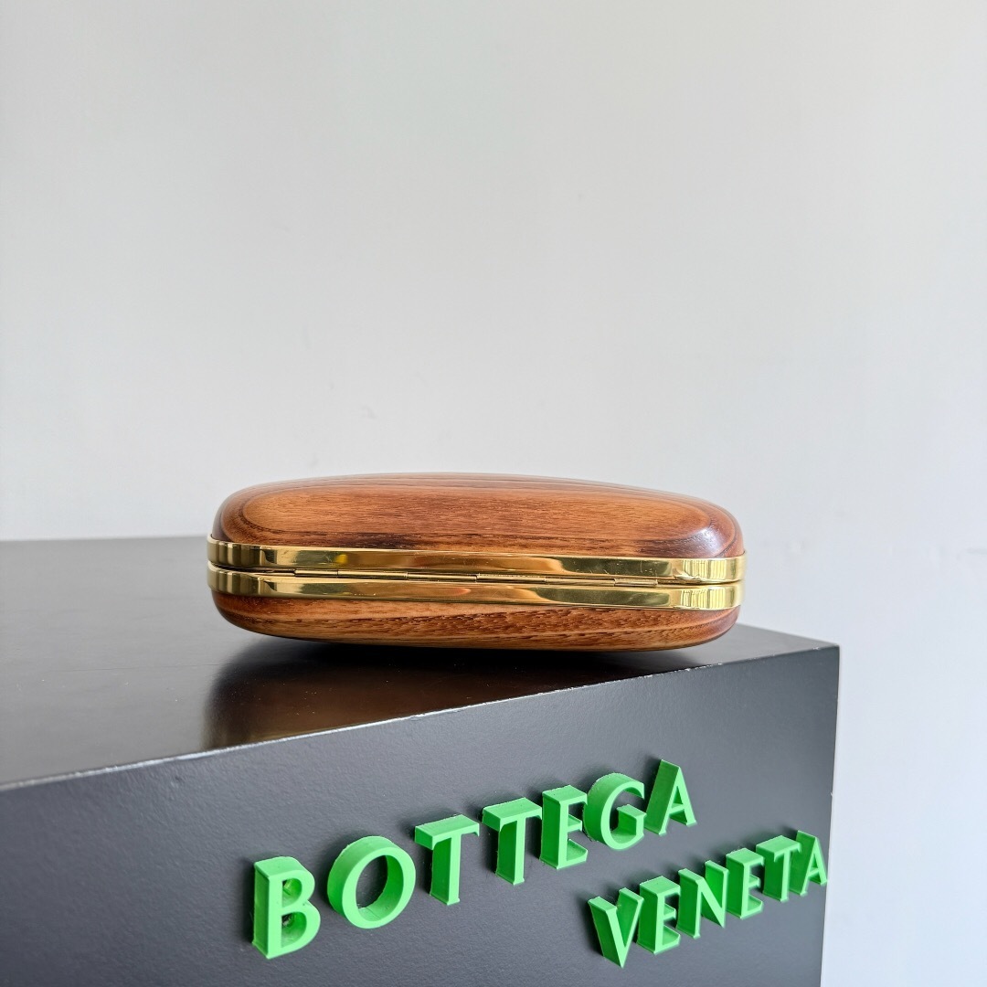 Bottega Veneta wooden clutch bag with a knot closure