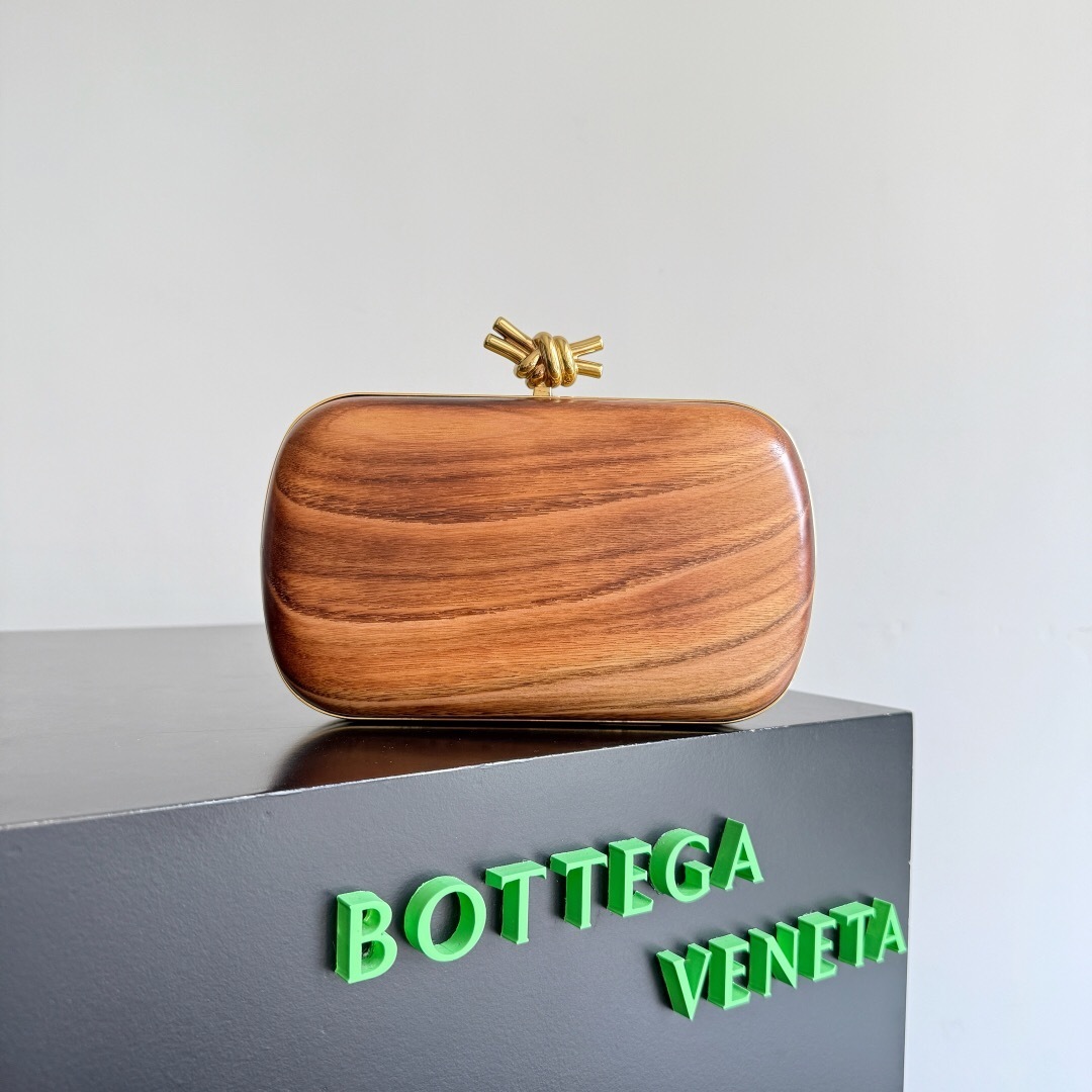 Bottega Veneta wooden clutch bag with a knot closure