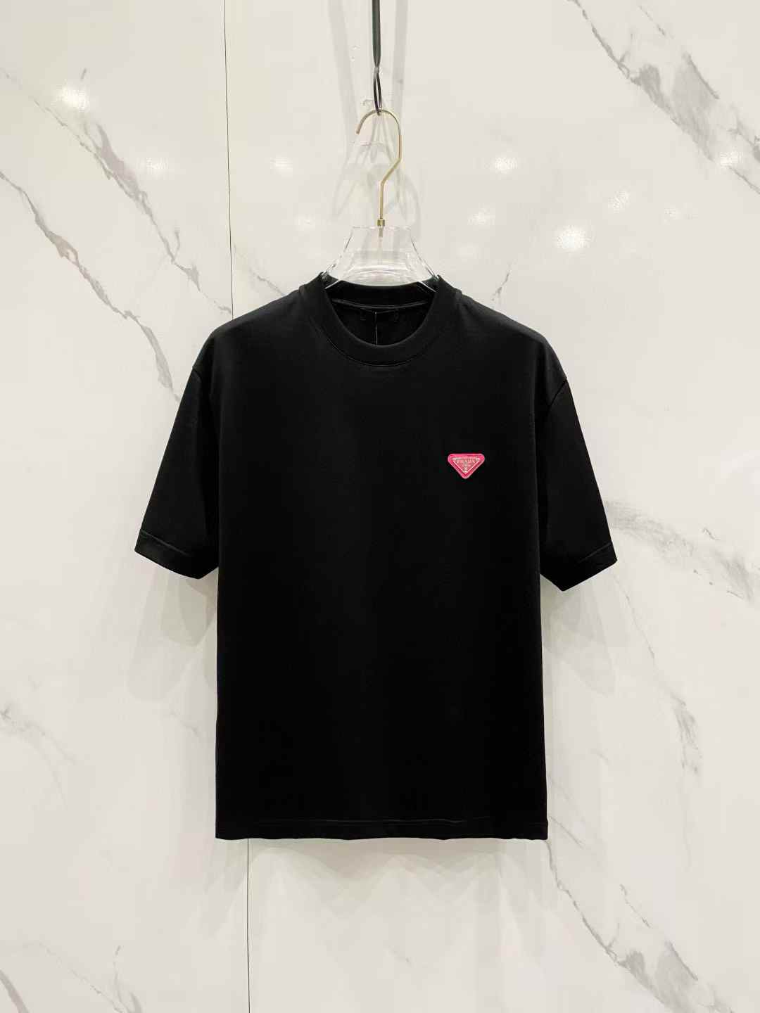 Prada cotton Black T-shirt with a pink enameled metal triangle logo