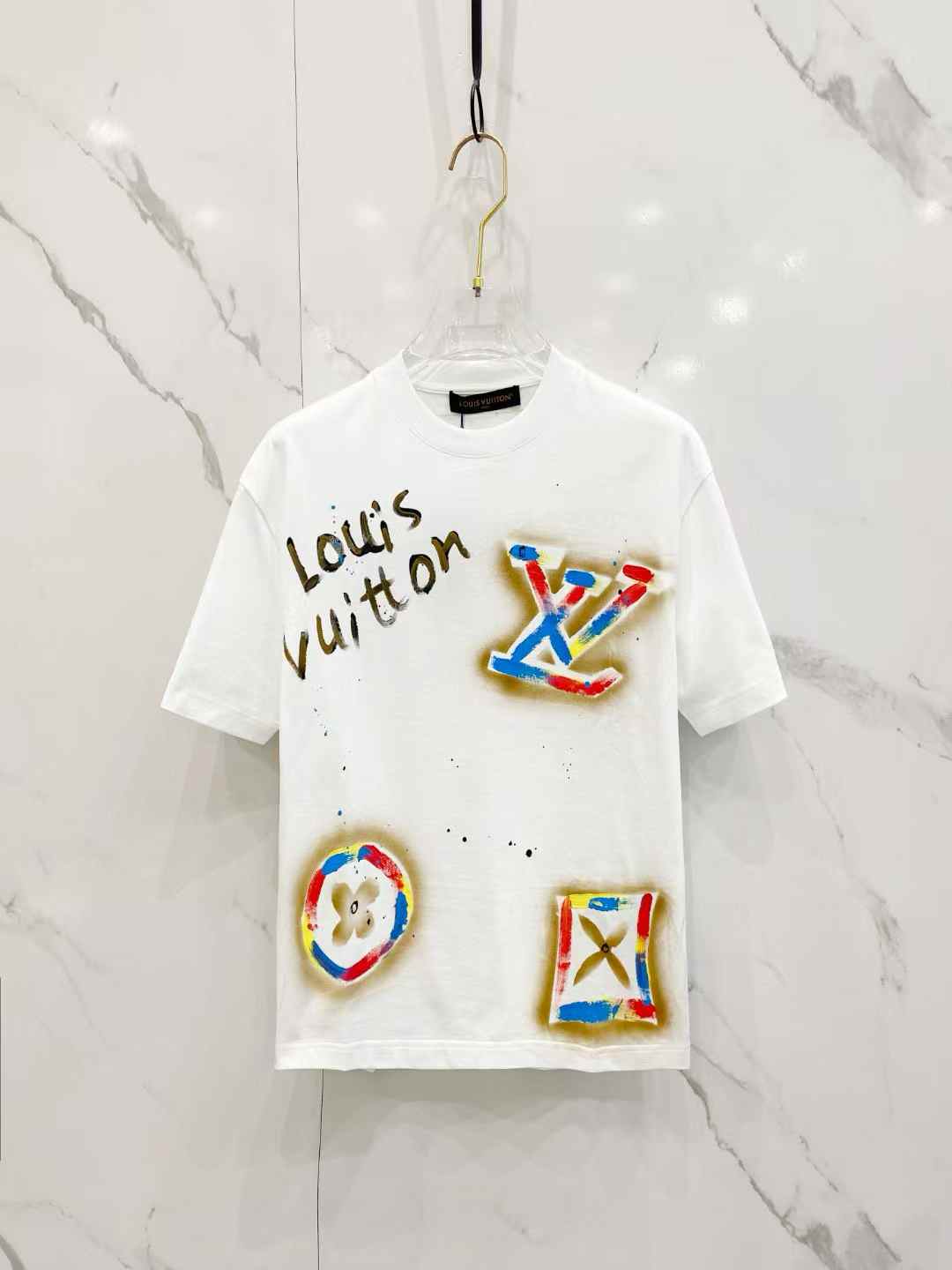 LV Drop Shoulder T-Shirt with a hand-painted or graffiti-style design of the brand name and logos
