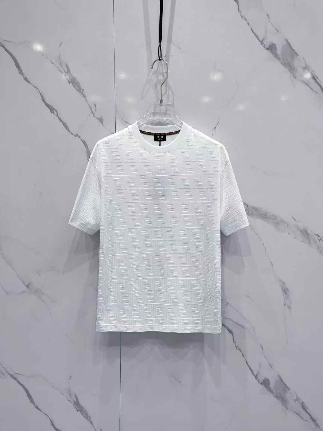 Fendi white men's oversized waffle knit t-shirt with a crew neck, short sleeves, and a textured pattern
