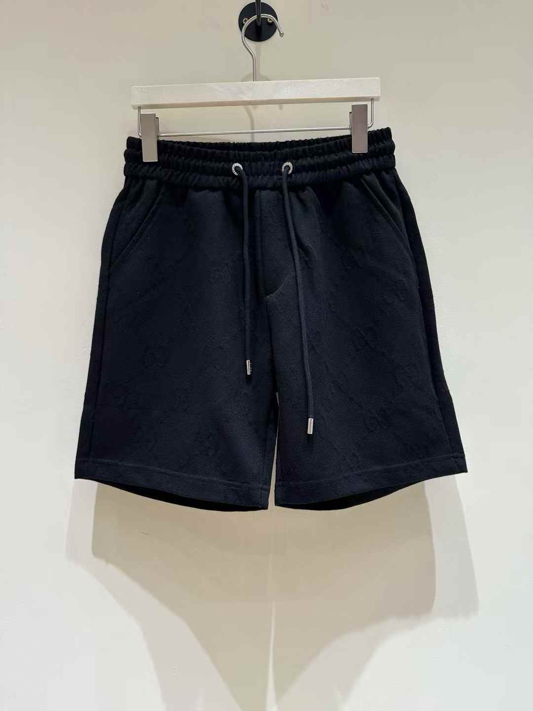 Gucci black shorts with a drawstring waist