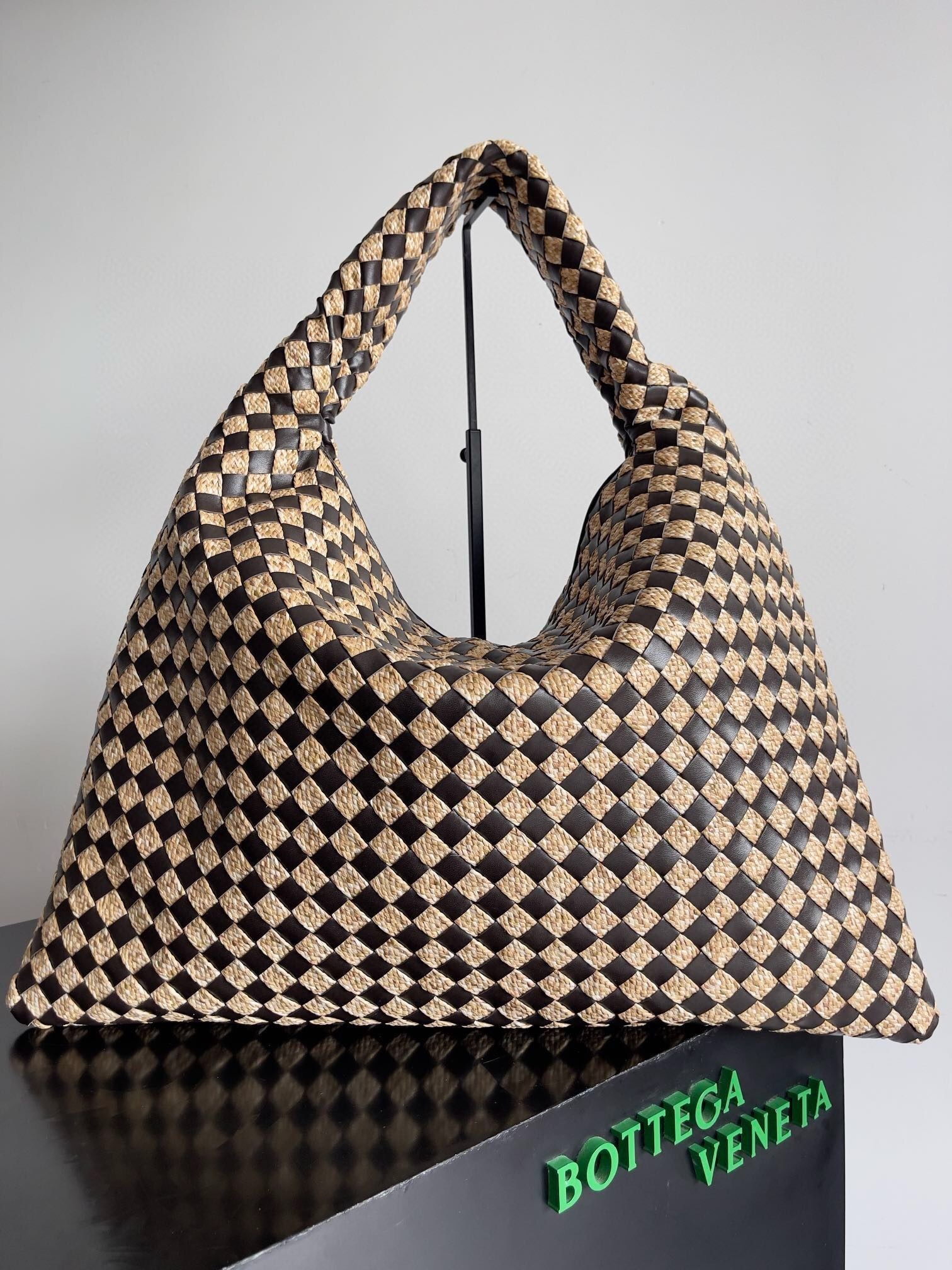 Bottega Veneta Large Hop shoulder bag in a black and beige woven leather