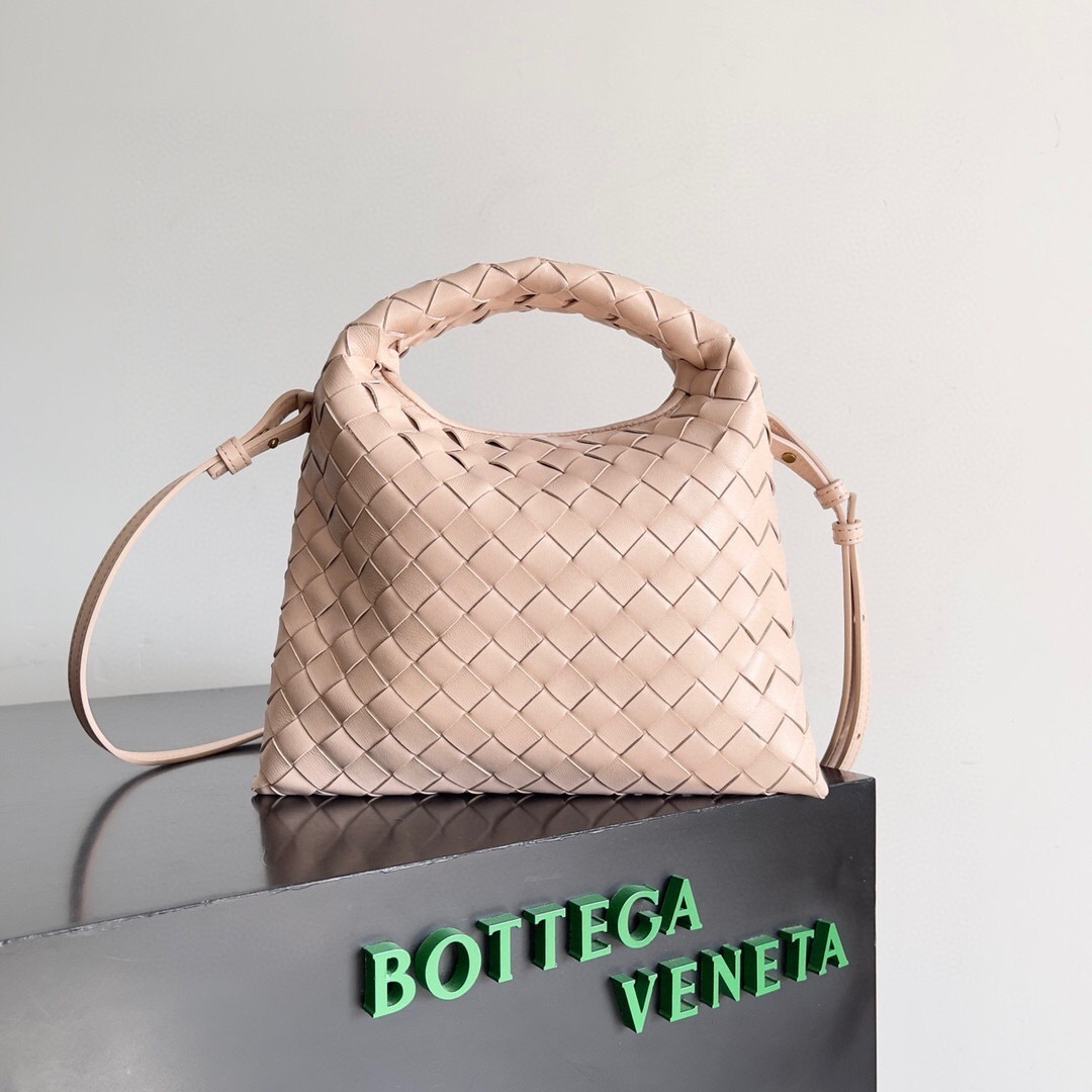 Bottega Veneta Mini Hop bag in pink leather, featuring Intrecciato craftsmanship