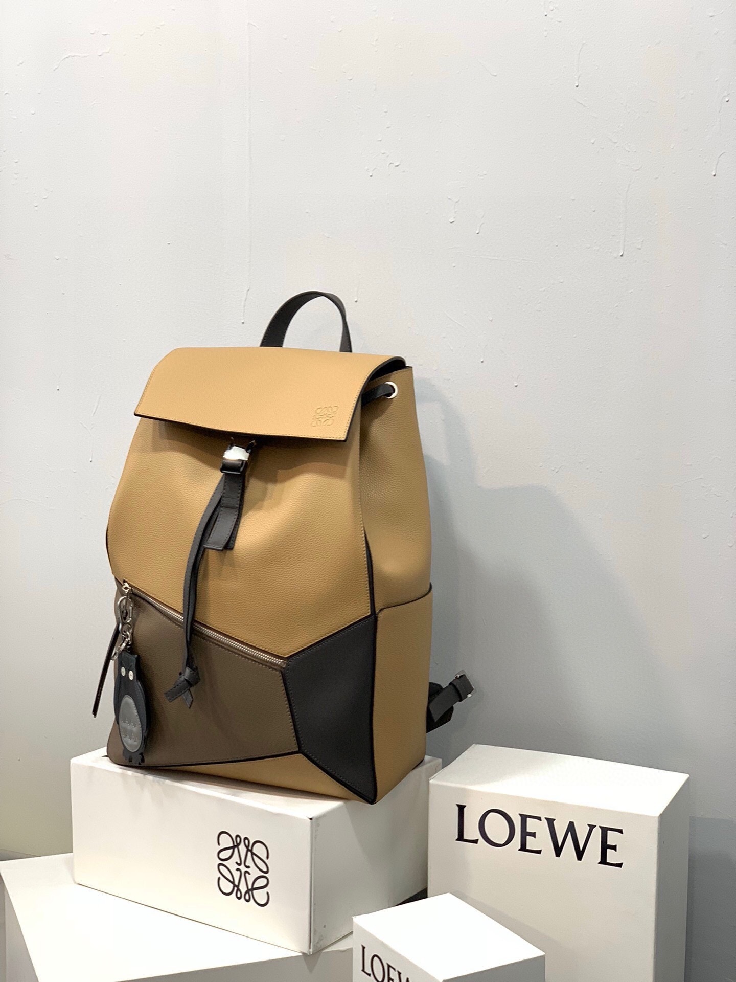 Loewe Puzzle backpack in a tan and black