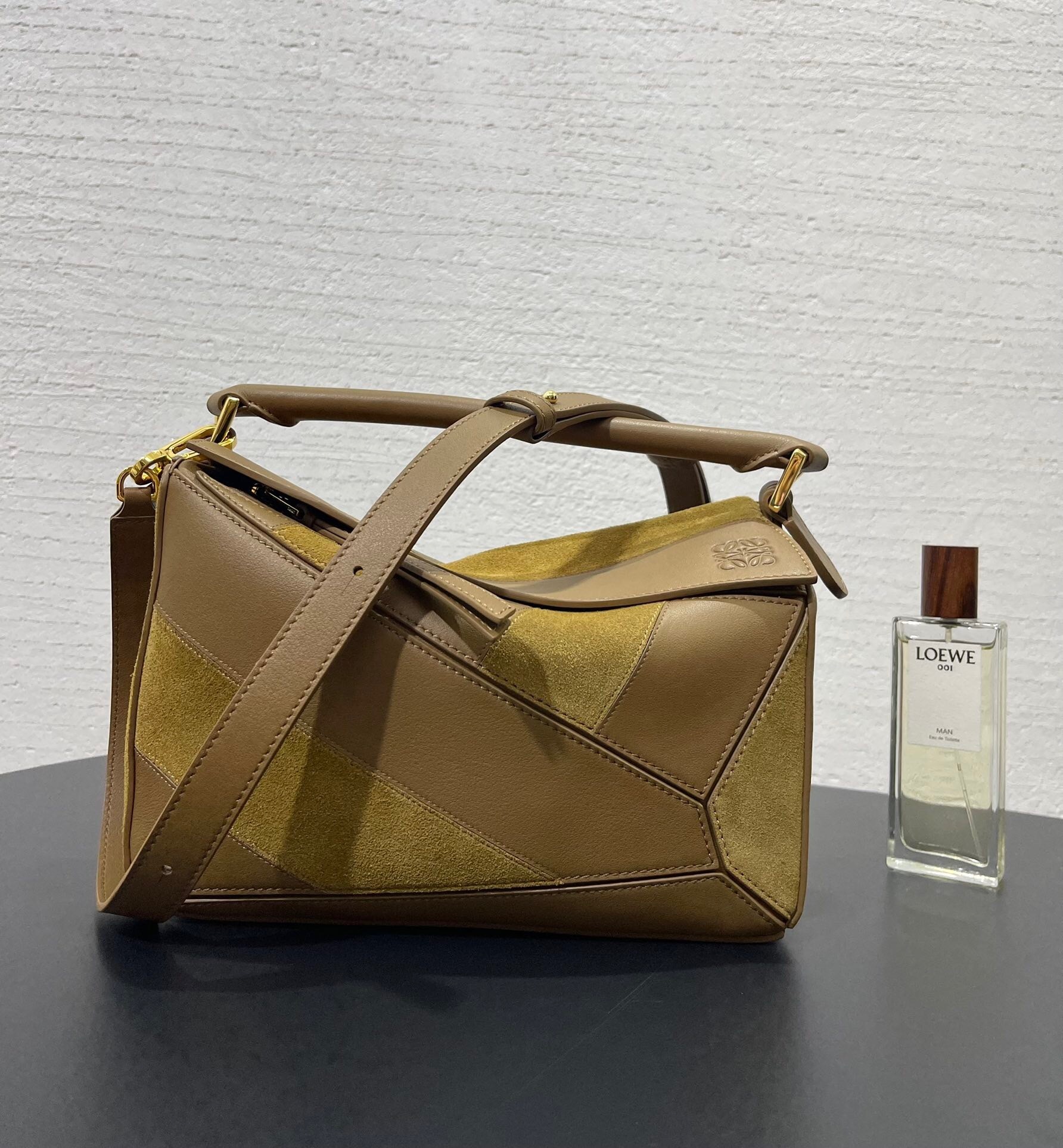 Loewe small Puzzle striped tote bag crafted in brown calfskin leather and suede panels