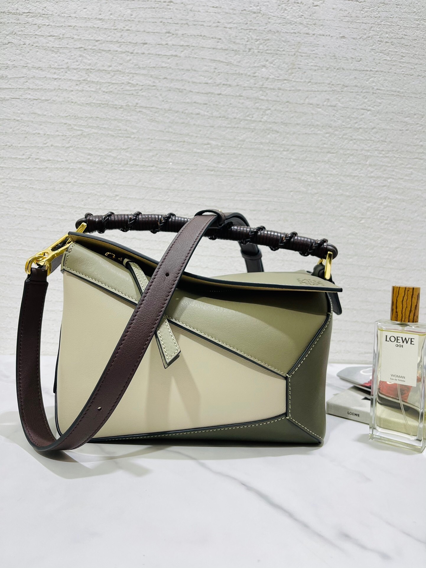 Loewe Puzzle Edge Small Bag in soft grained calfskin with a woven top handle