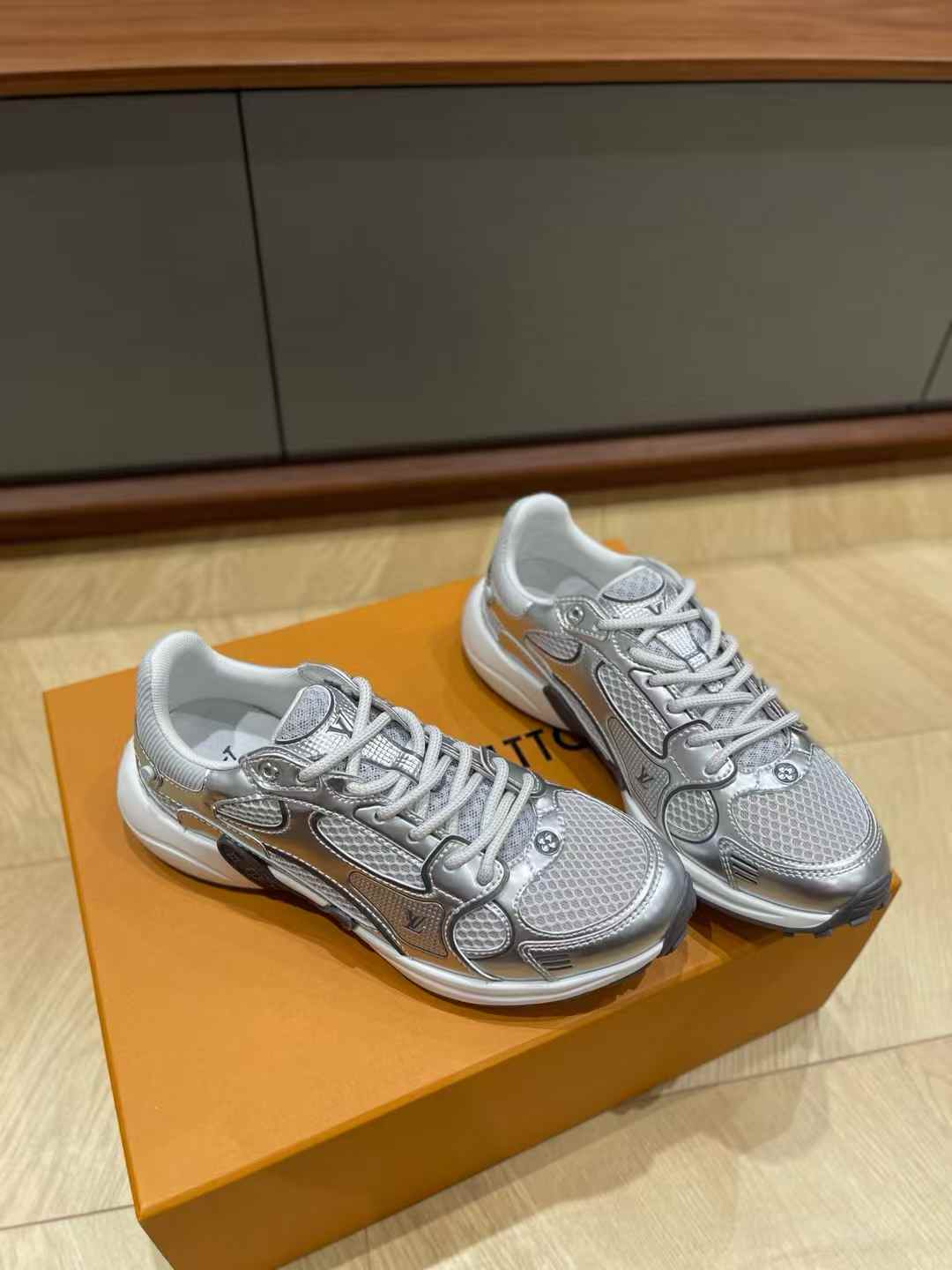 LV Olympia sneaker in silver, crafted from a mix of technical materials including mesh and metallic synthetic leather