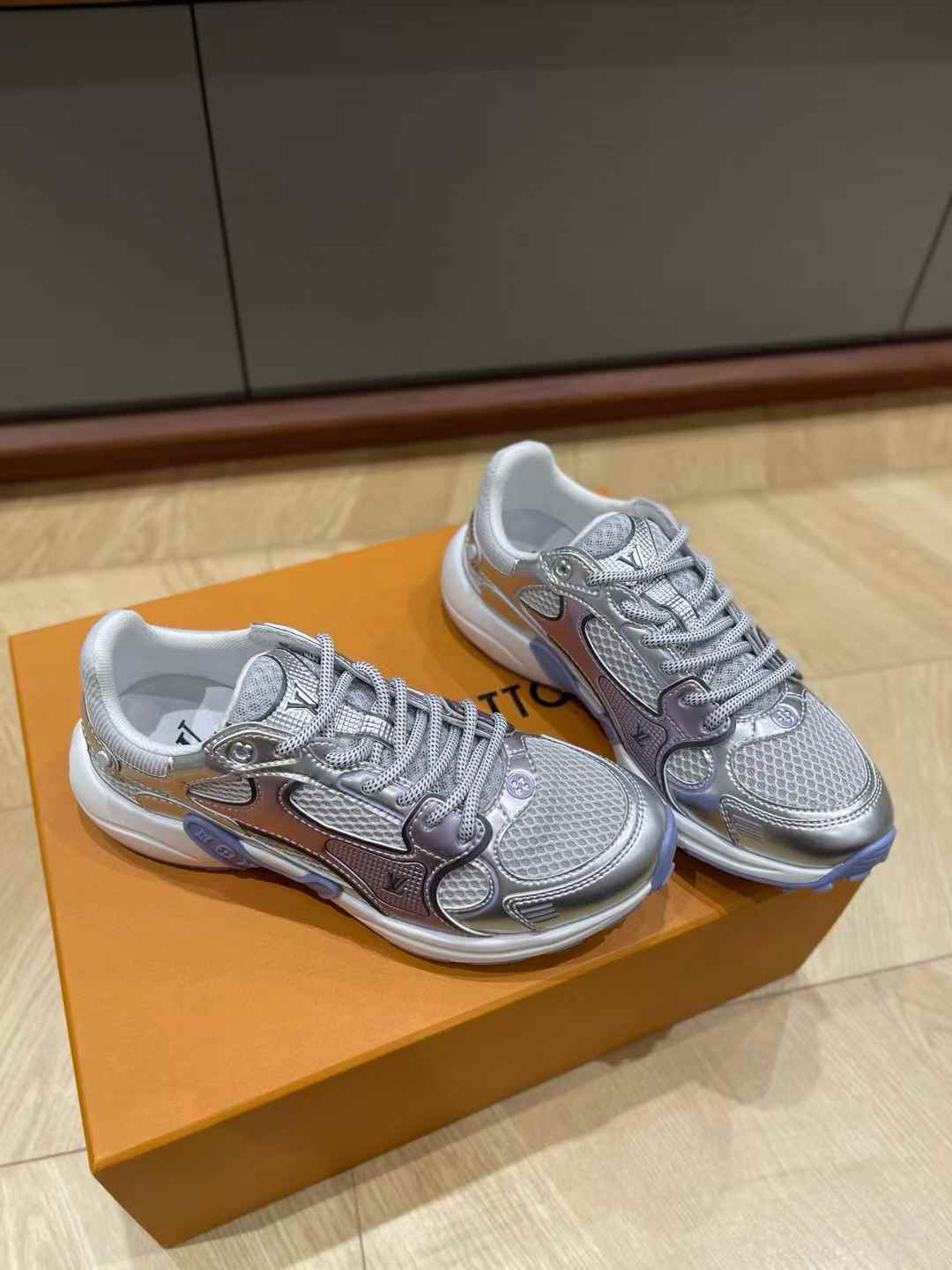 LV Olympia sneaker in a mix of technical materials, including mesh and metallic synthetic leather