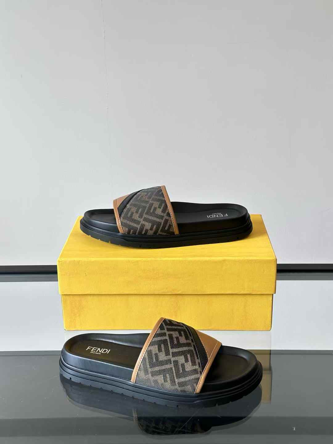 Fendi Diagonal FF Jacquard slides in gray and black leather