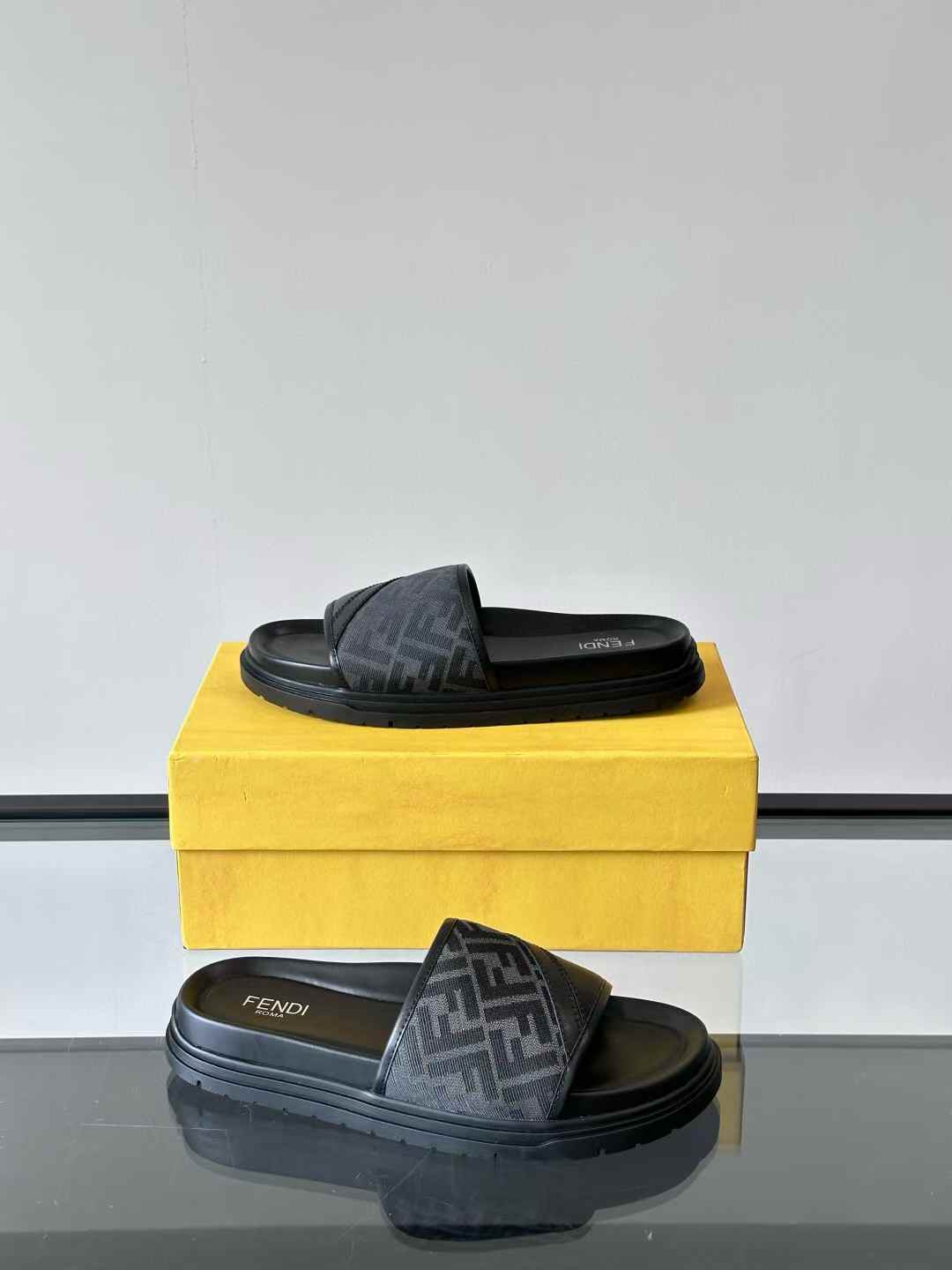 Fendi Feel Sandals in black fabric with a jacquard FF motif