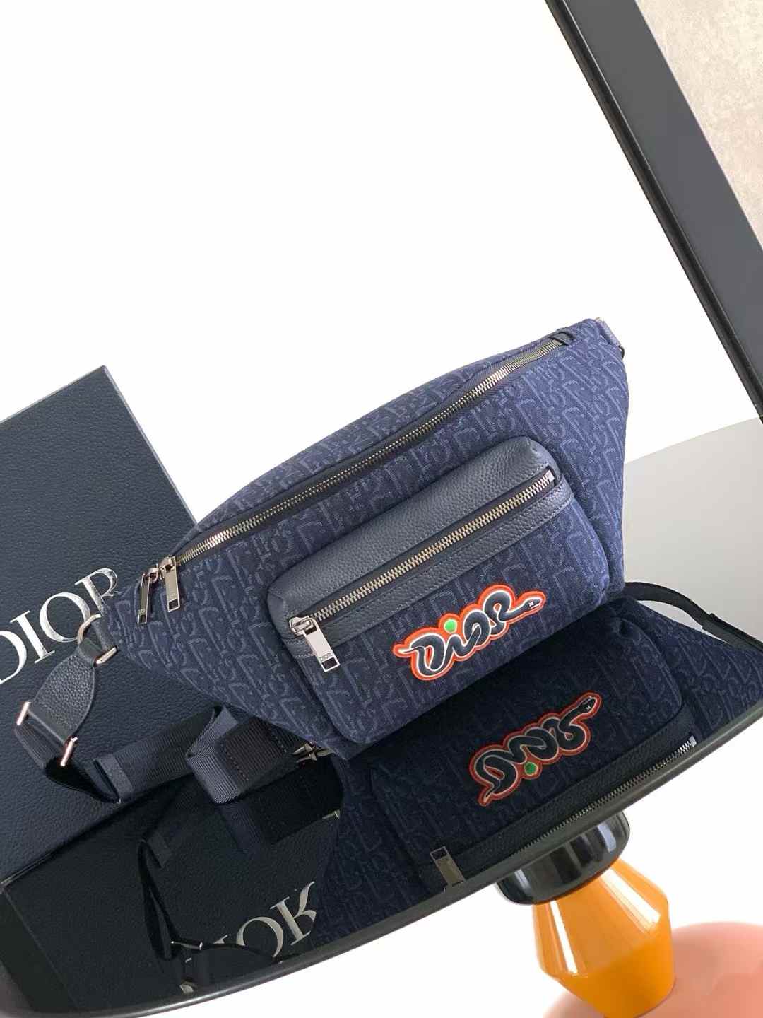 Dior and KAWS collection bumbag in blue Dior Oblique jacquard