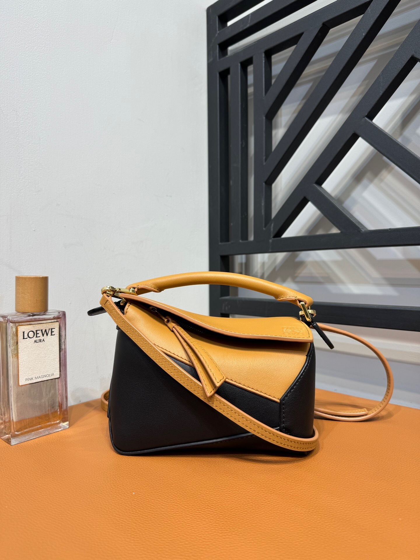 Loewe Puzzle Edge bag in black and tan leather