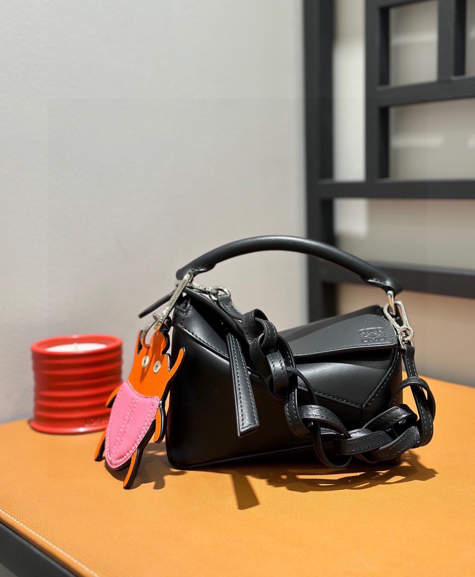 Loewe Mini Puzzle bag in black soft grained calfskin