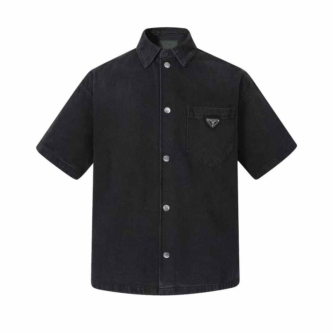 Prada short-sleeved denim shirt with a patch pocket and enameled metal triangle logo, made from cotton with a washed treatment
