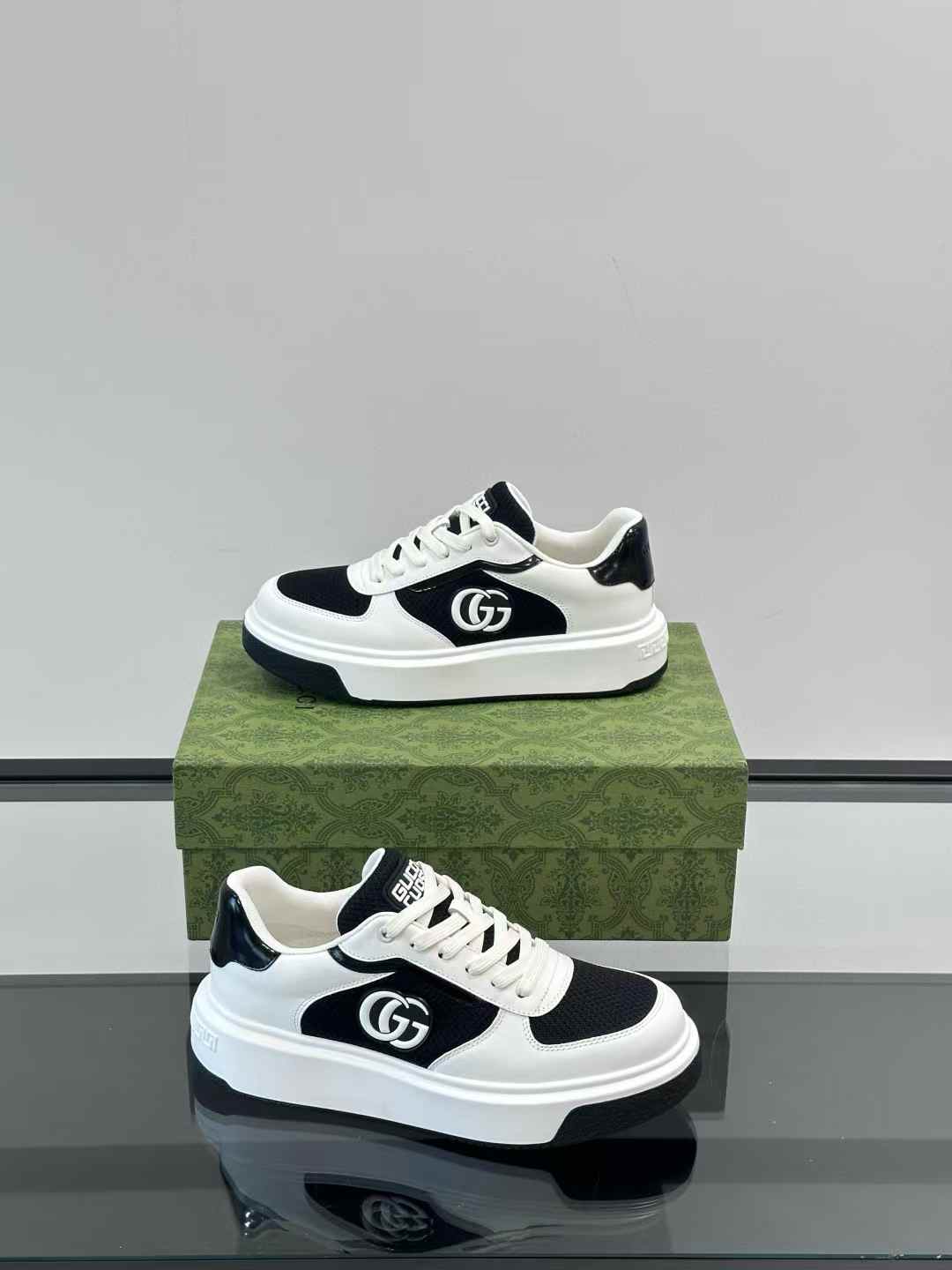 Gucci sneakers featuring the Interlocking G logo and a bi-color rubber sole