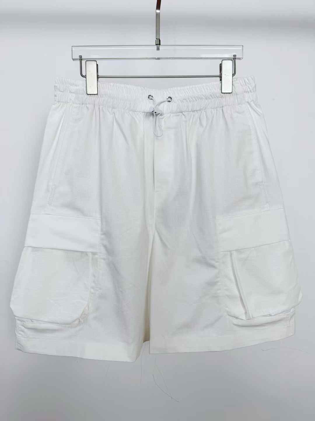Dior white cargo shorts with a drawstring waist