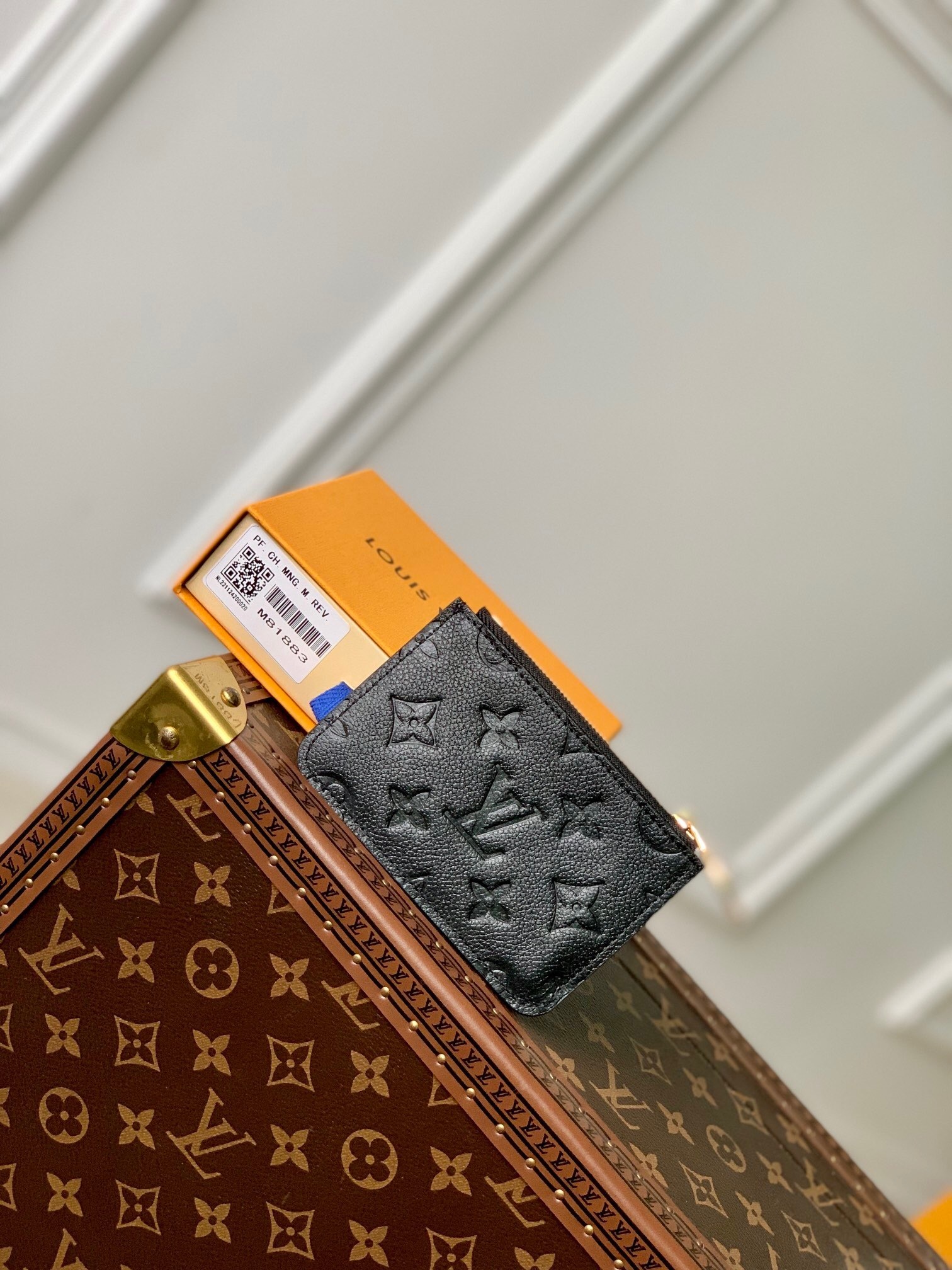 LV wallet made from embossed leather black