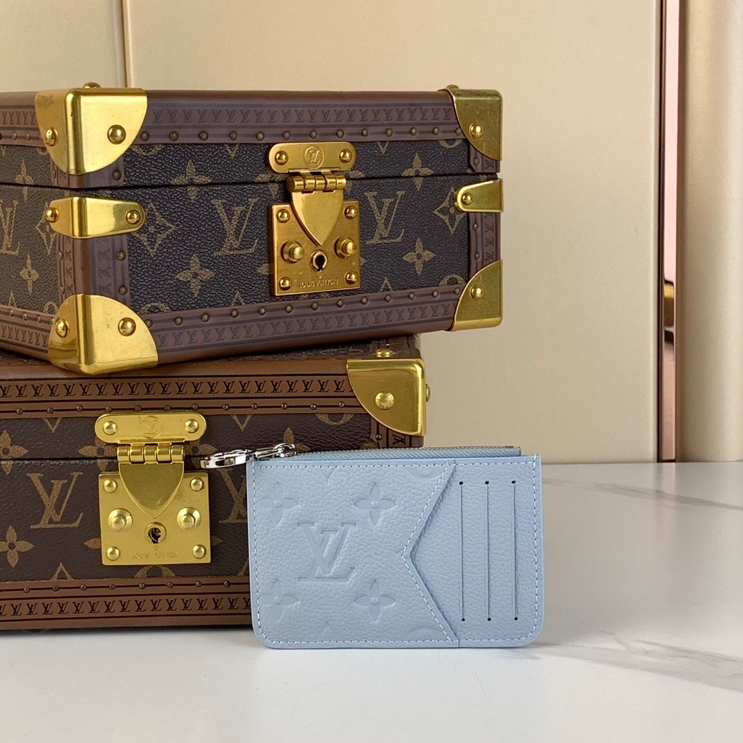 LV Romy Card Holder in light blue Monogram Empreinte leather