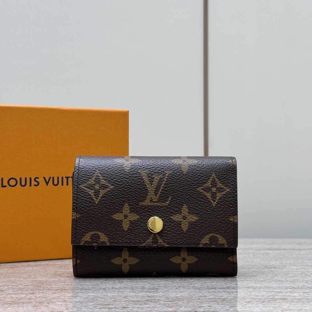 LV Monogram 6 Key Holder in brown monogram canvas with gold-tone hardware