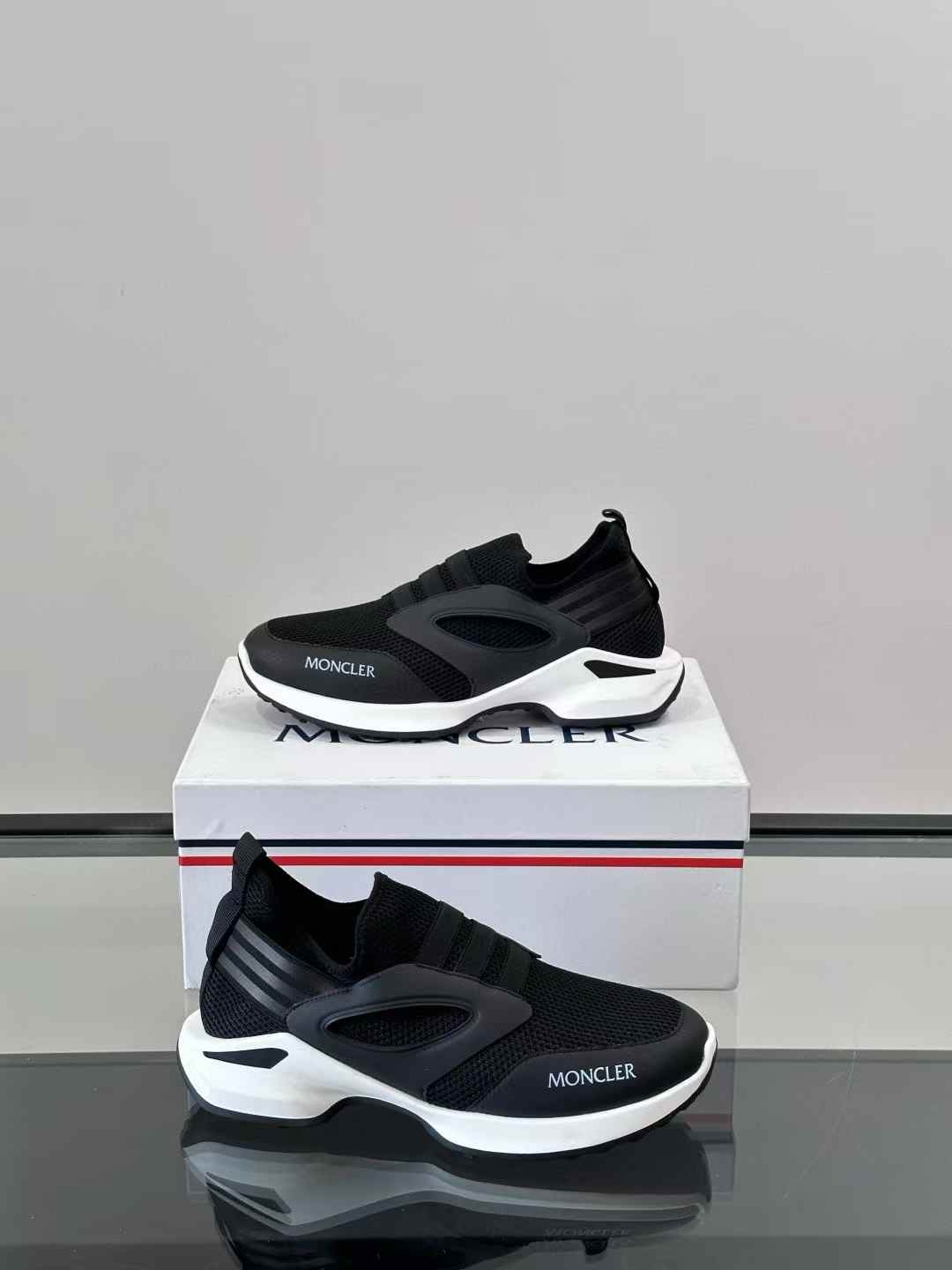 Moncler black and white sneakers with a thick sole