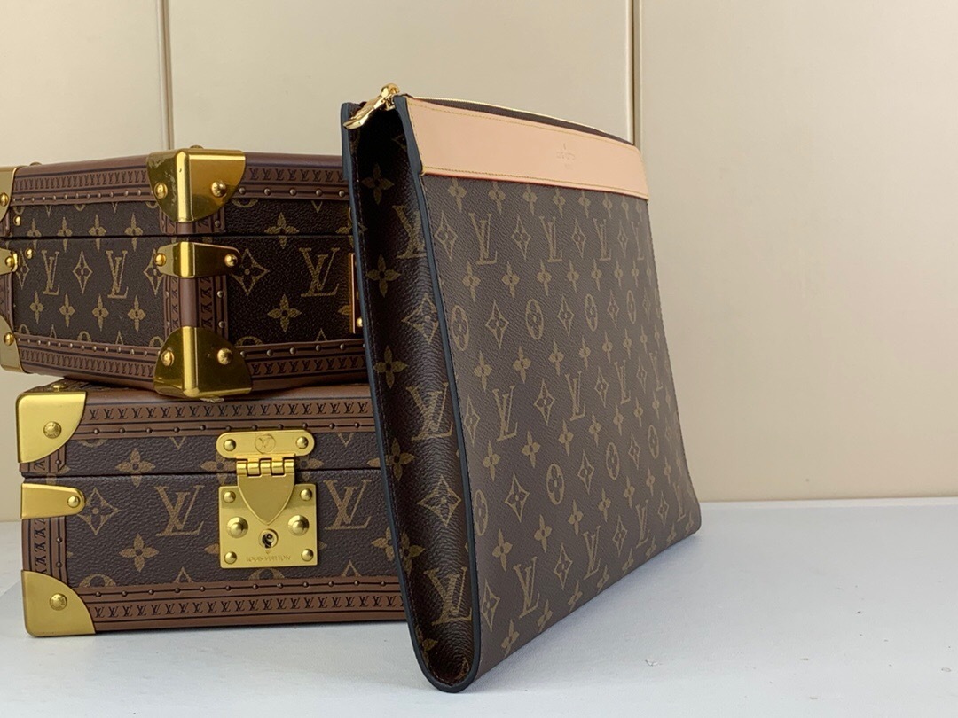 LV Pochette Jour in Monogram coated canvas with aged natural cowhide leather trim