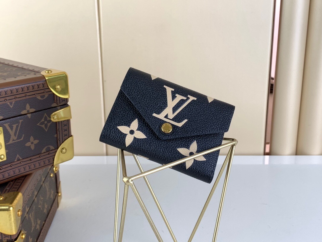 LV Victorine Bicolor Monogram Empreinte Leather Wallet in Black and Beige