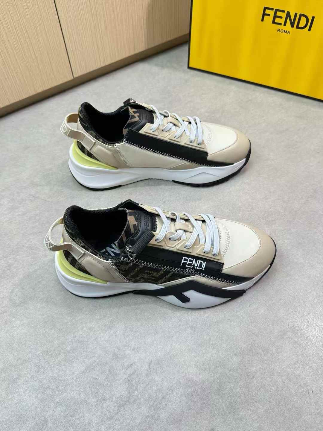 Fendi Flow sneakers in beige and black with yellow accents