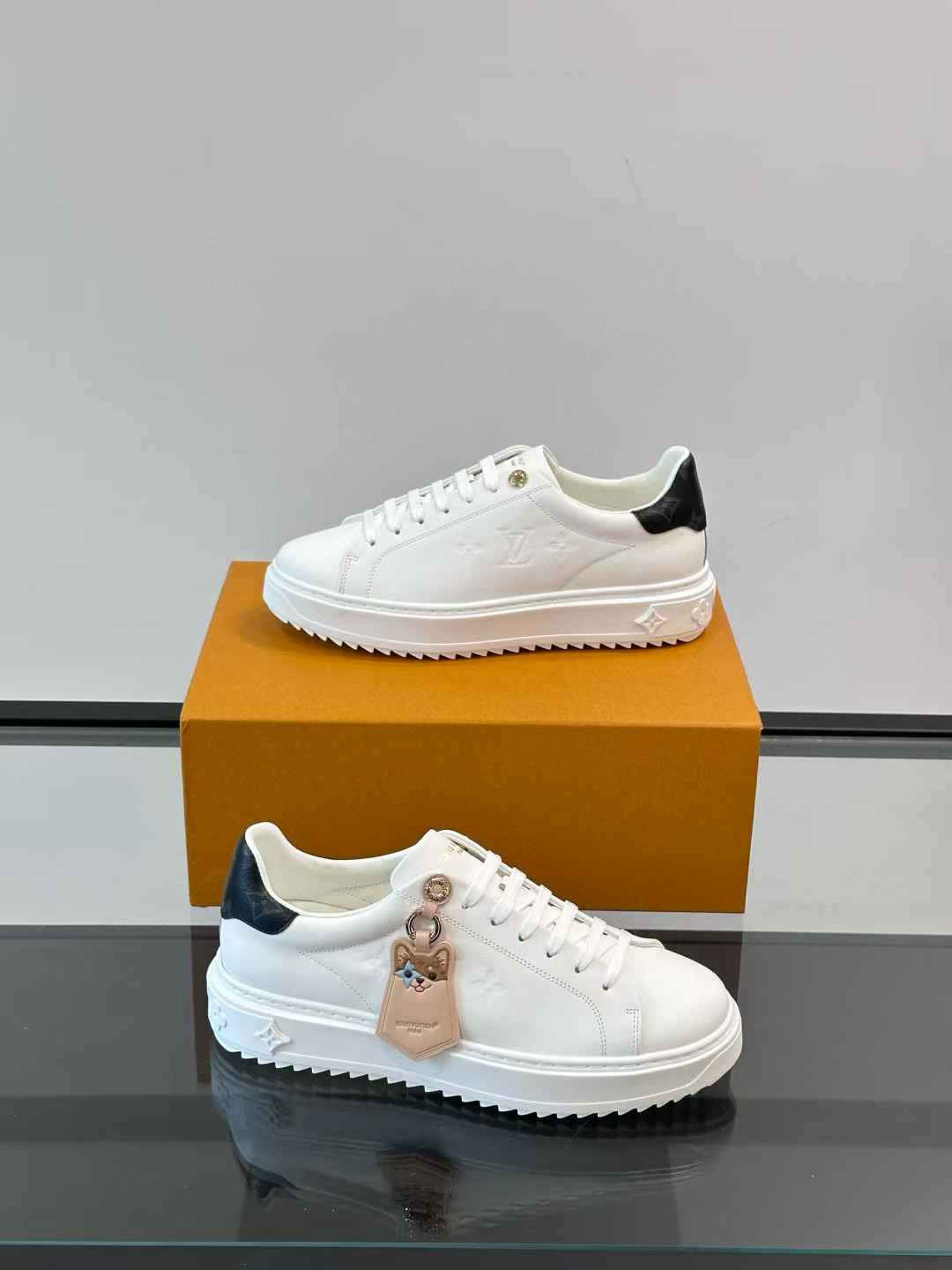 LV Time Out sneaker soft calf leather and featuring a key bell with an animal face