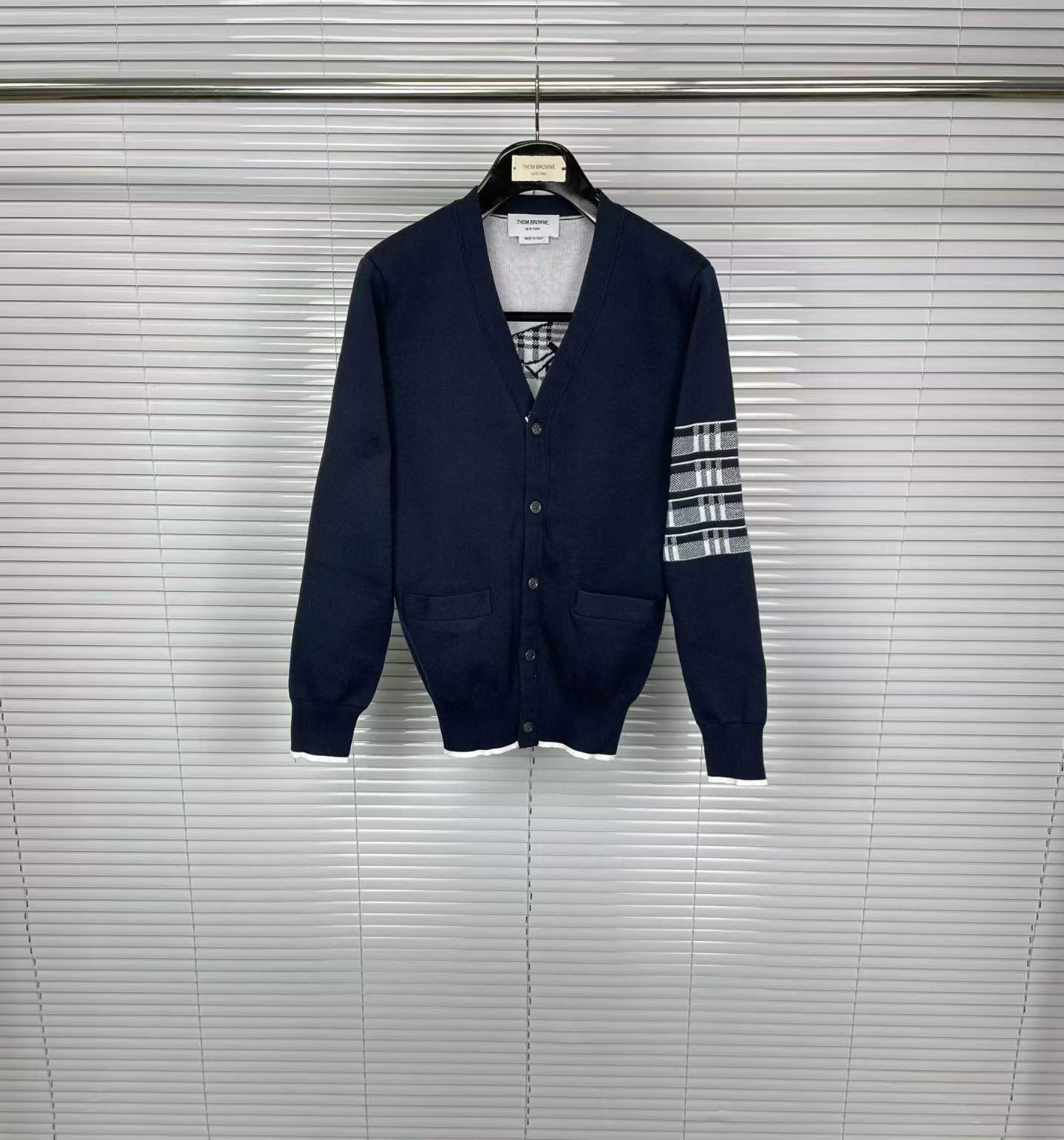Thom Browne navy blue wool V-neck cardigan with 4-bar stripes on the sleeve