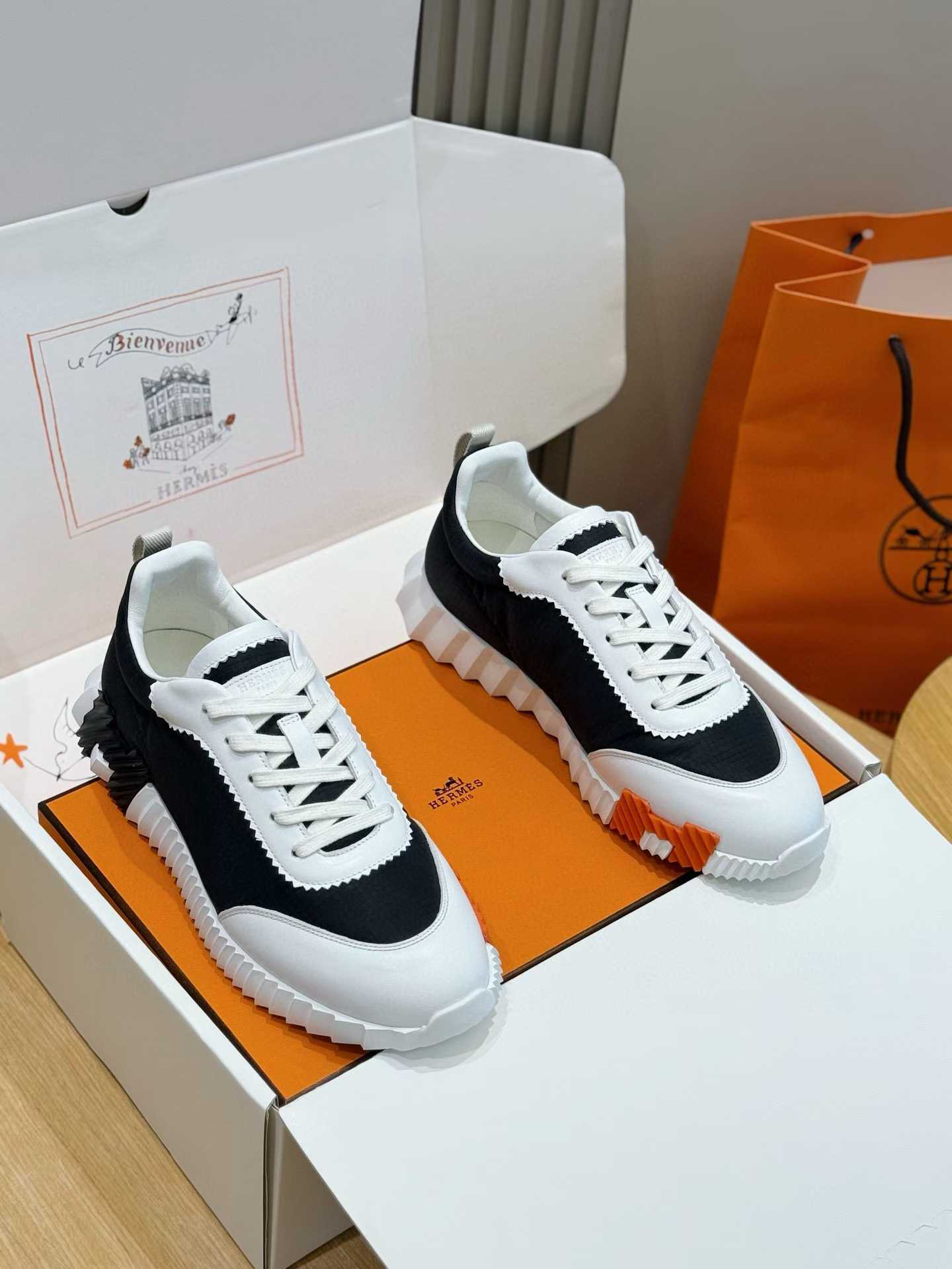 Hermes Bouncing sneakers in calfskin and suede goatskin with a white rubber sole and black rubber inserts