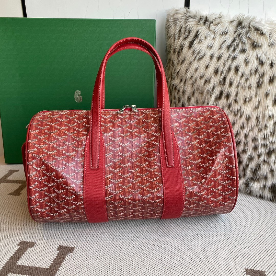 Goyard Barrel 40 Sports Bag in burgundy or orange with the signature Goyardine canvas