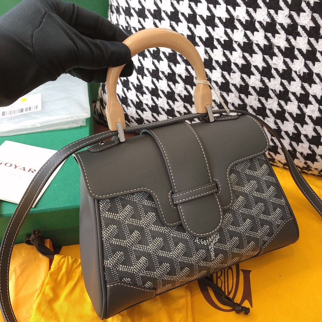 Goyard Saïgon Souple Mini bag in grey Goyardine coated canvas with a wooden top handle and palladium hardware