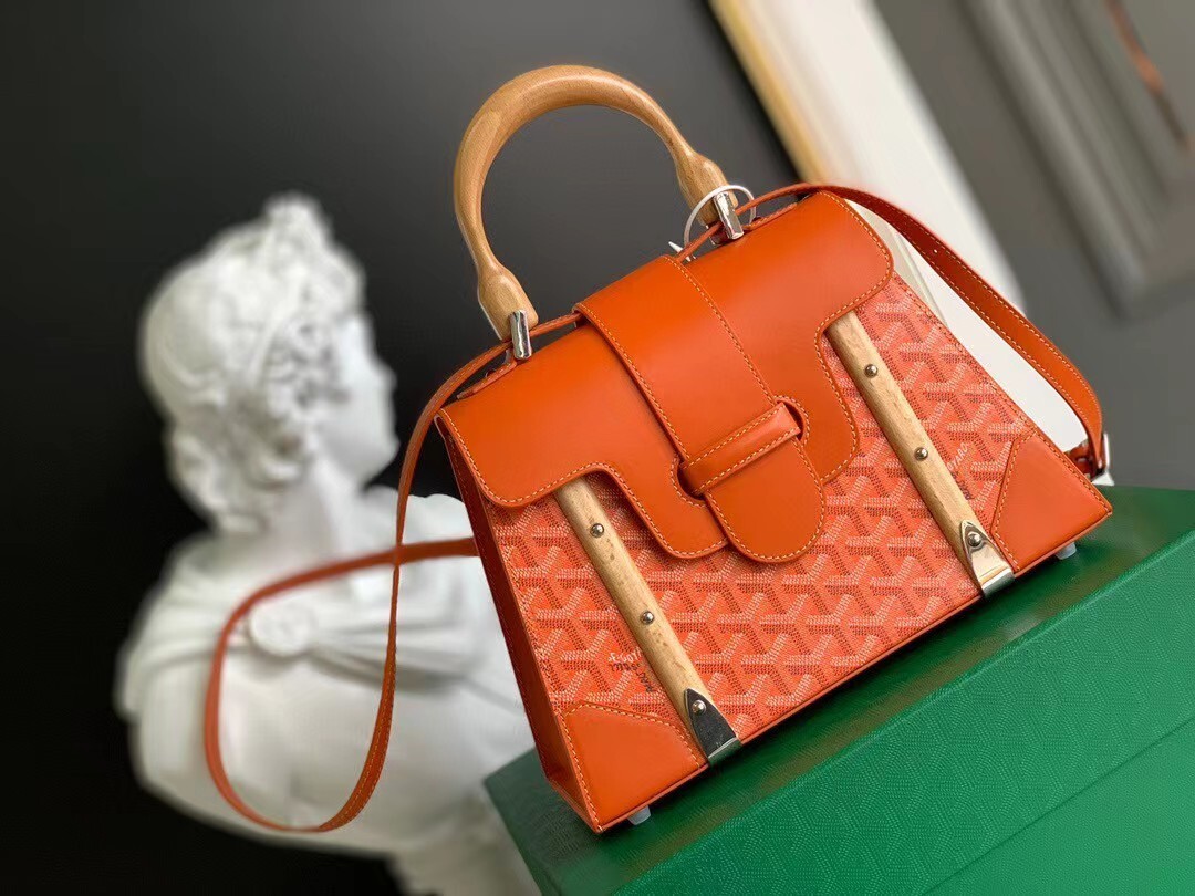 Goyard Saïgon Structuré PM bag in orange Goyardine canvas and leather with wood trim